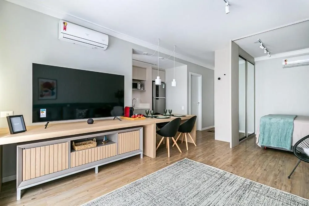 Living room in K-Platz 406 - Studio Elegante e Moderno na Melhor Localização do Continente