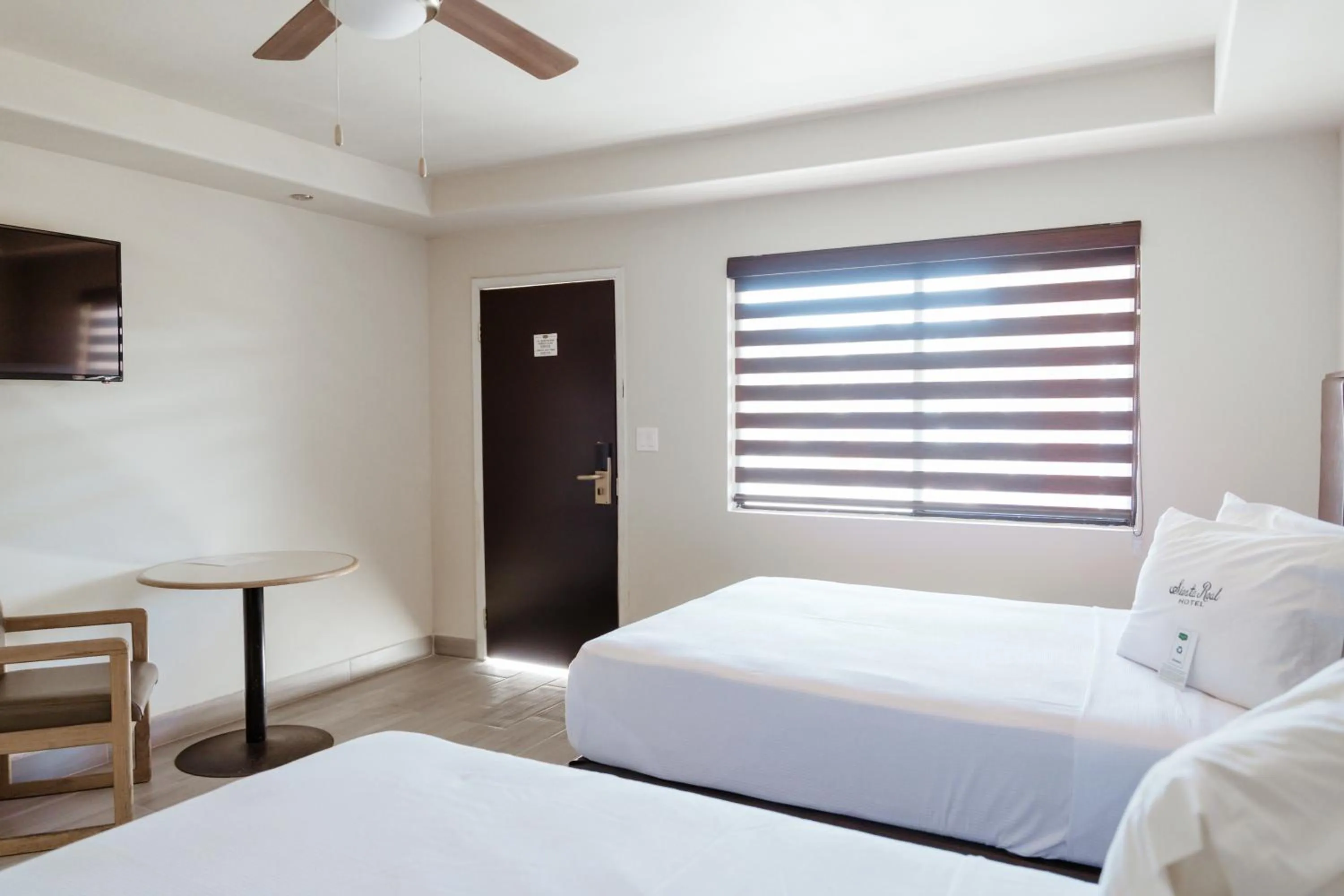 Bed in Hotel Siesta Real