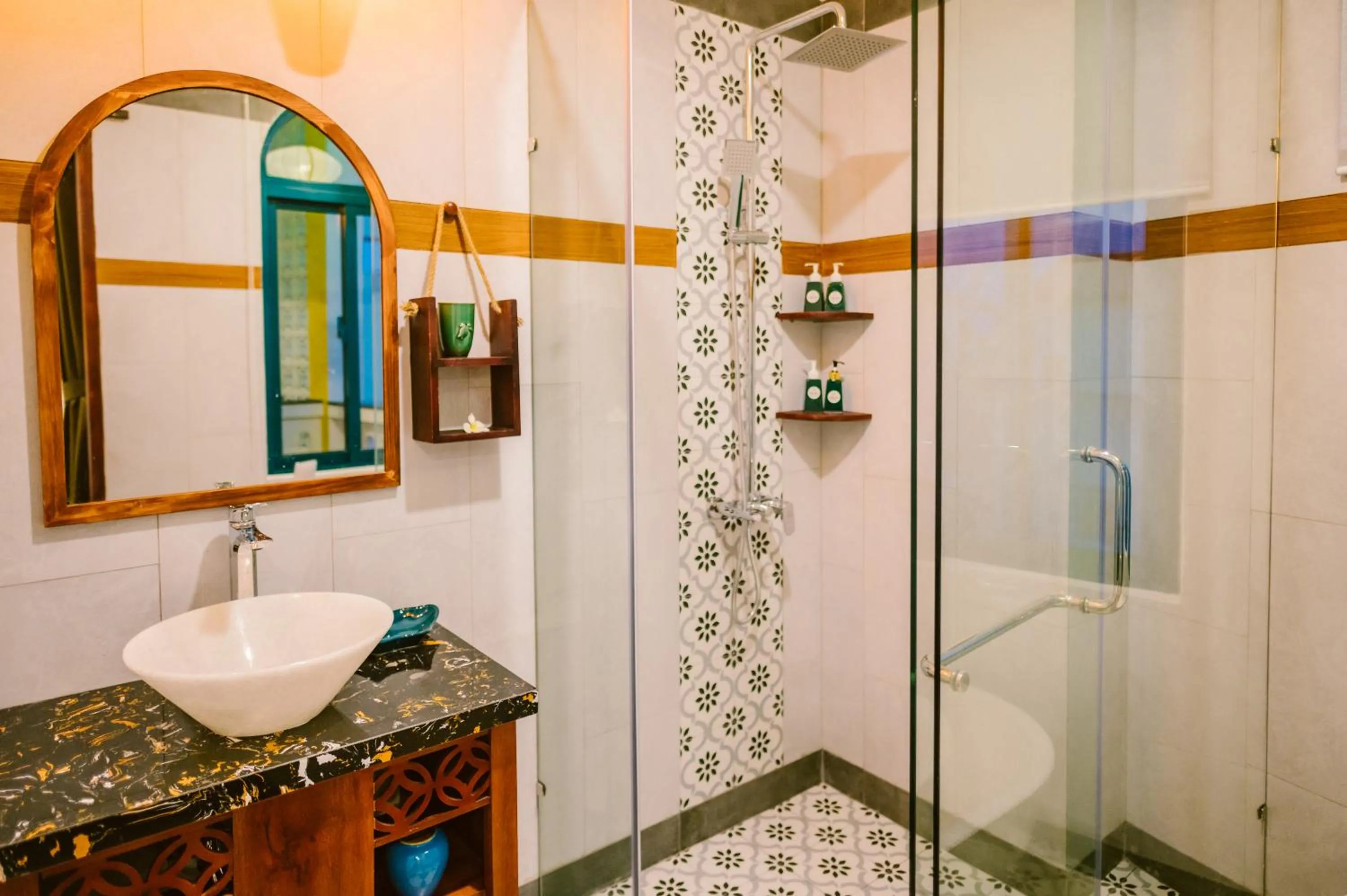 Bathroom in De'Colore Villa Hoi An