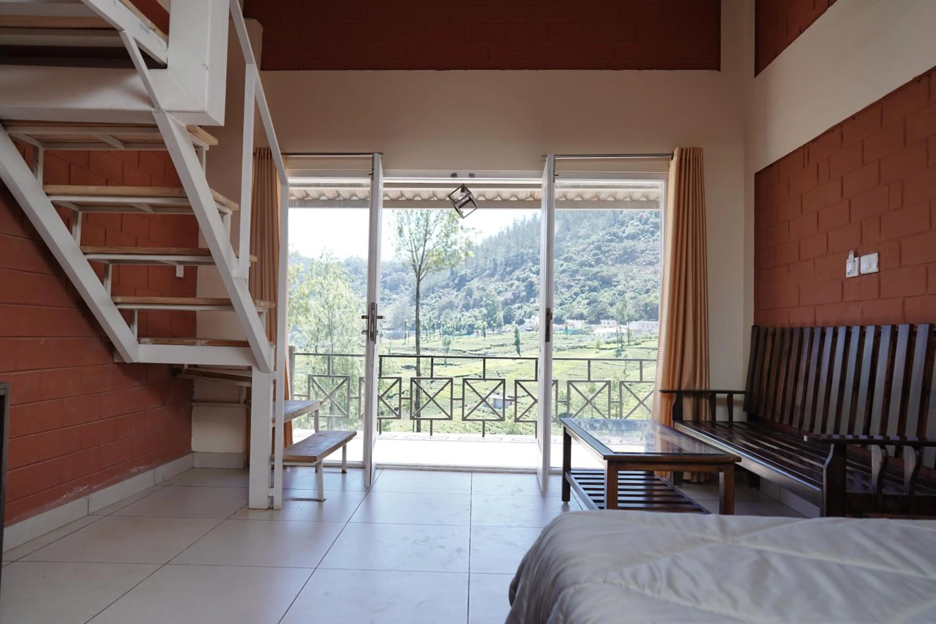 Bed in Tea Leaf Stays by Brown Tree Resorts