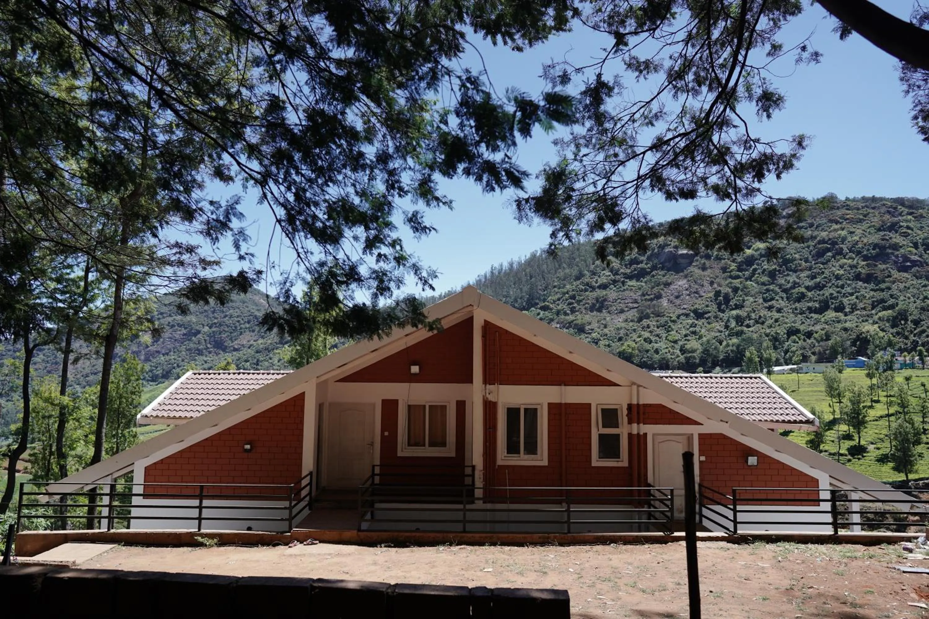 Property building in Tea Leaf Stays by Brown Tree Resorts