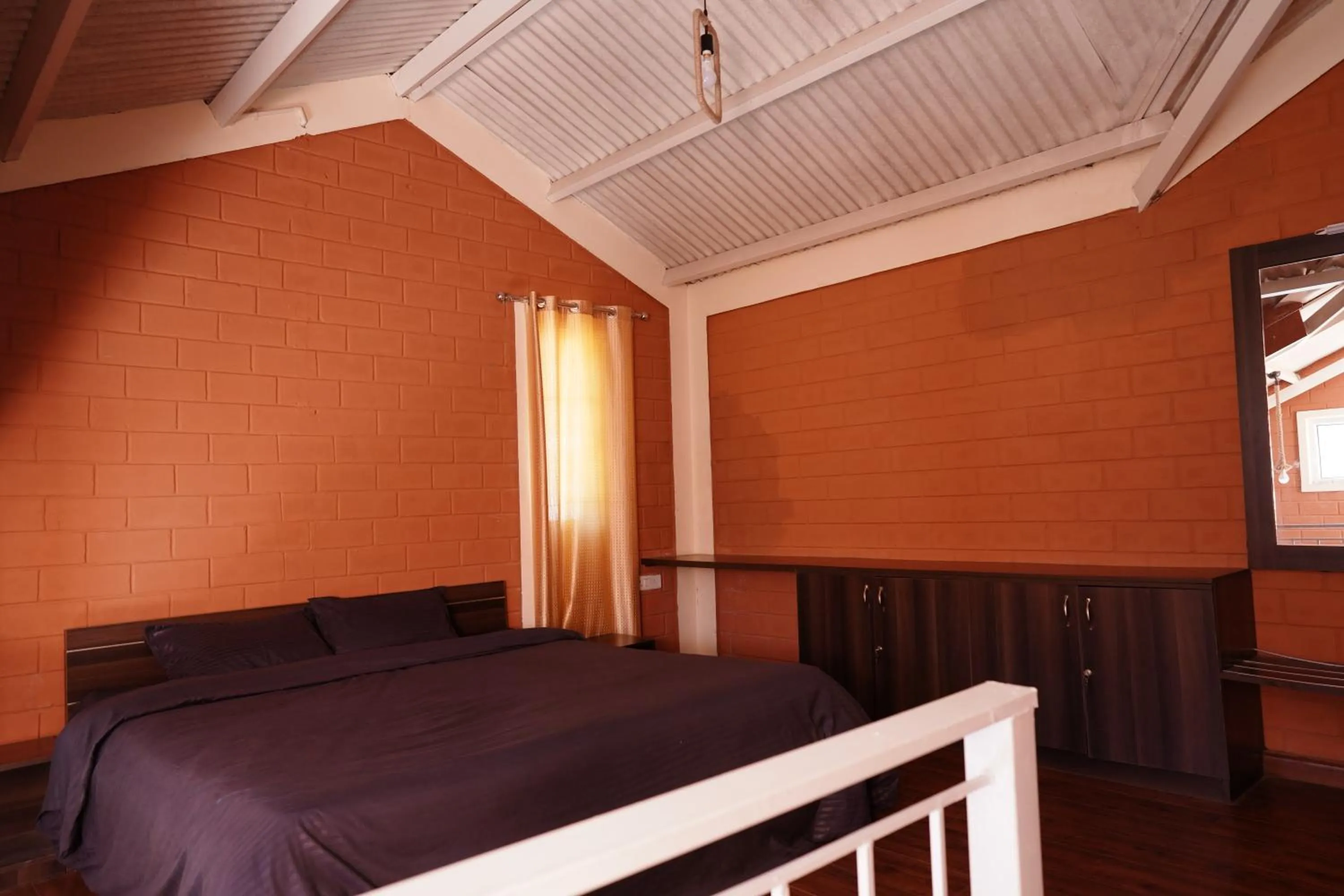 Bed in Tea Leaf Stays by Brown Tree Resorts