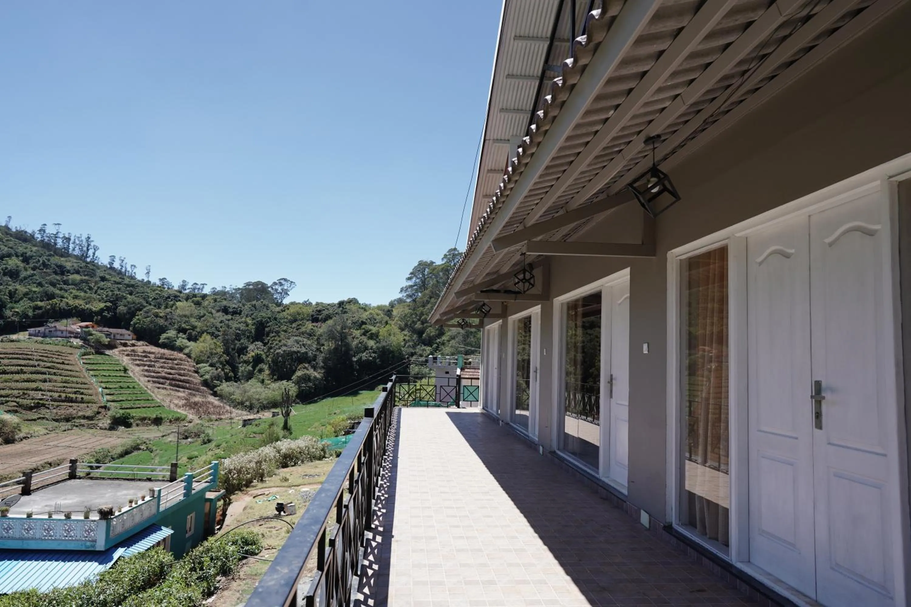 Property building in Tea Leaf Stays by Brown Tree Resorts