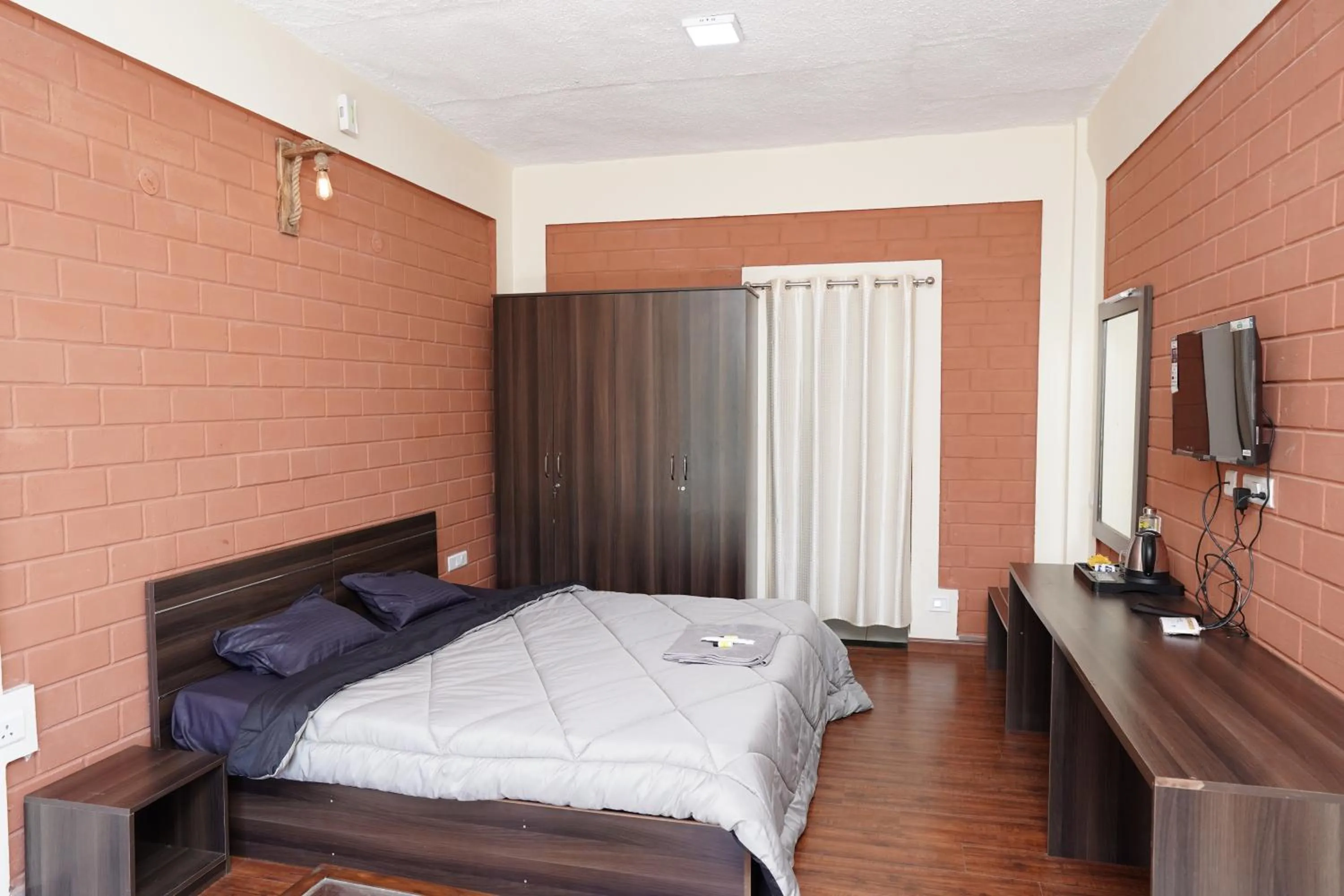 Bed in Tea Leaf Stays by Brown Tree Resorts