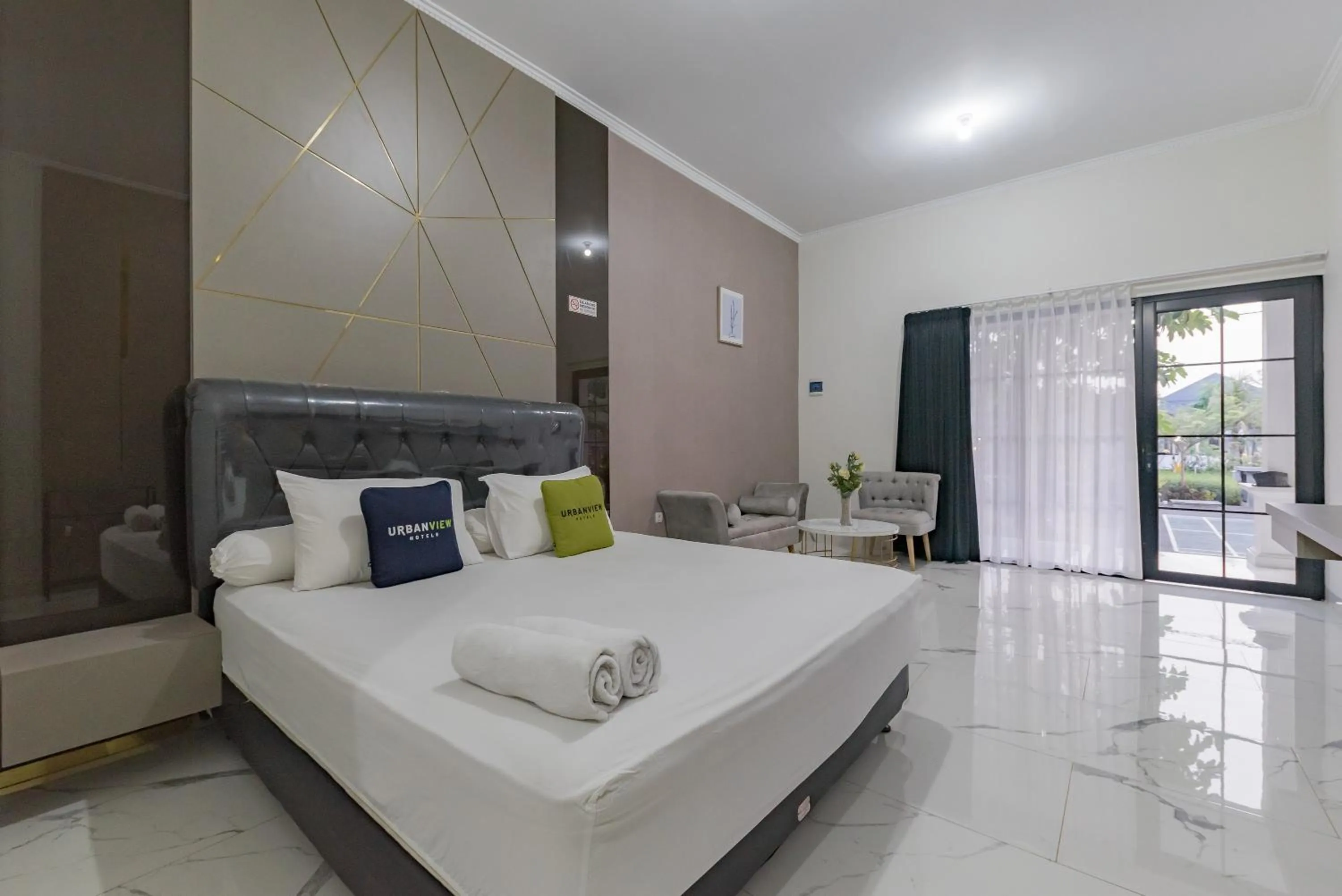 Bed in Urbanview Hotel Khayrizsan Tasikmalaya by RedDoorz