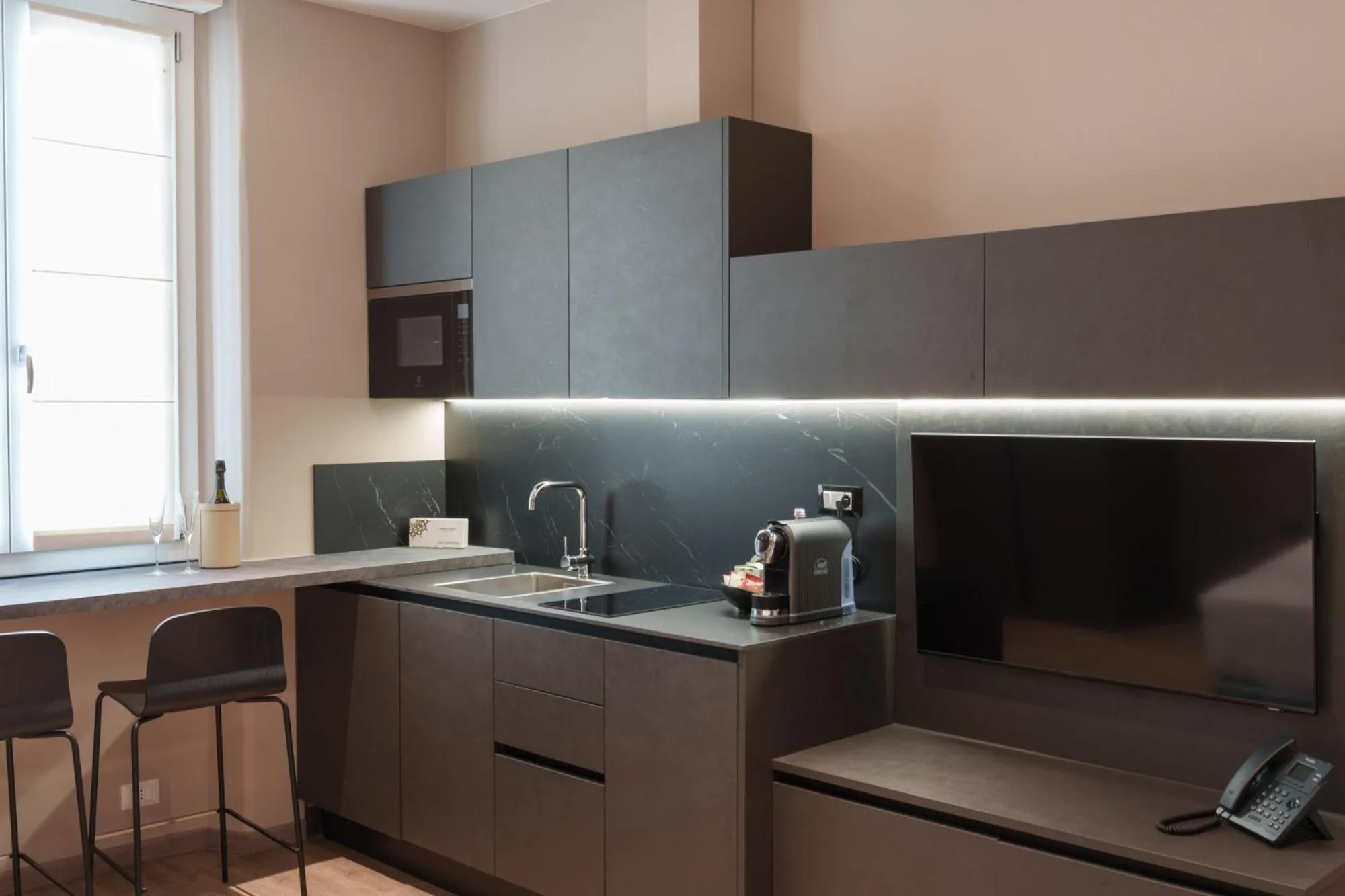 Kitchen or kitchenette in Vi Suites