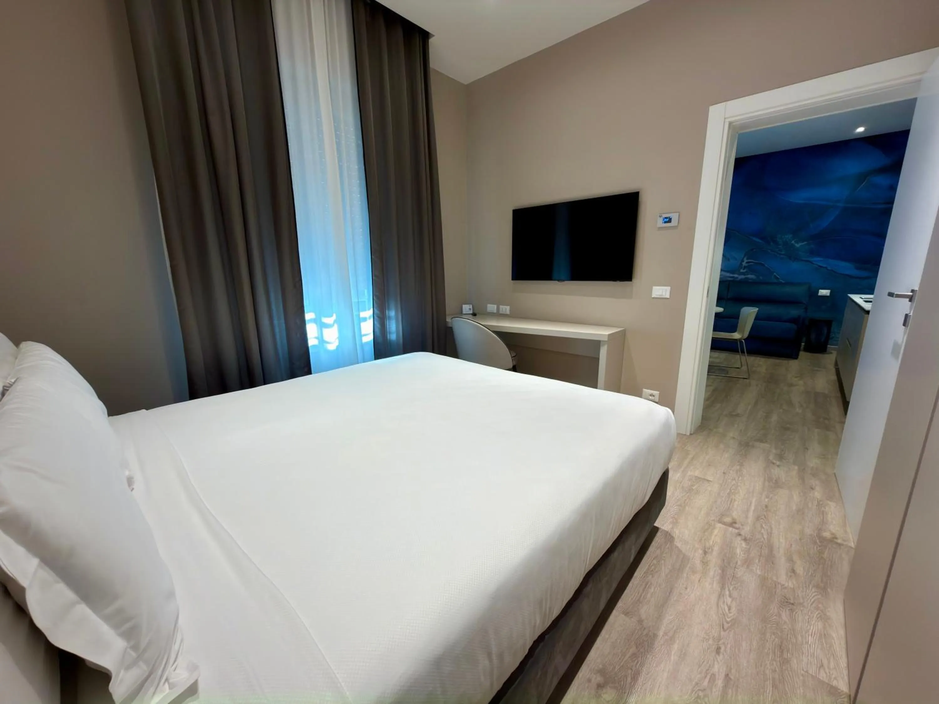 Bed in Vi Suites