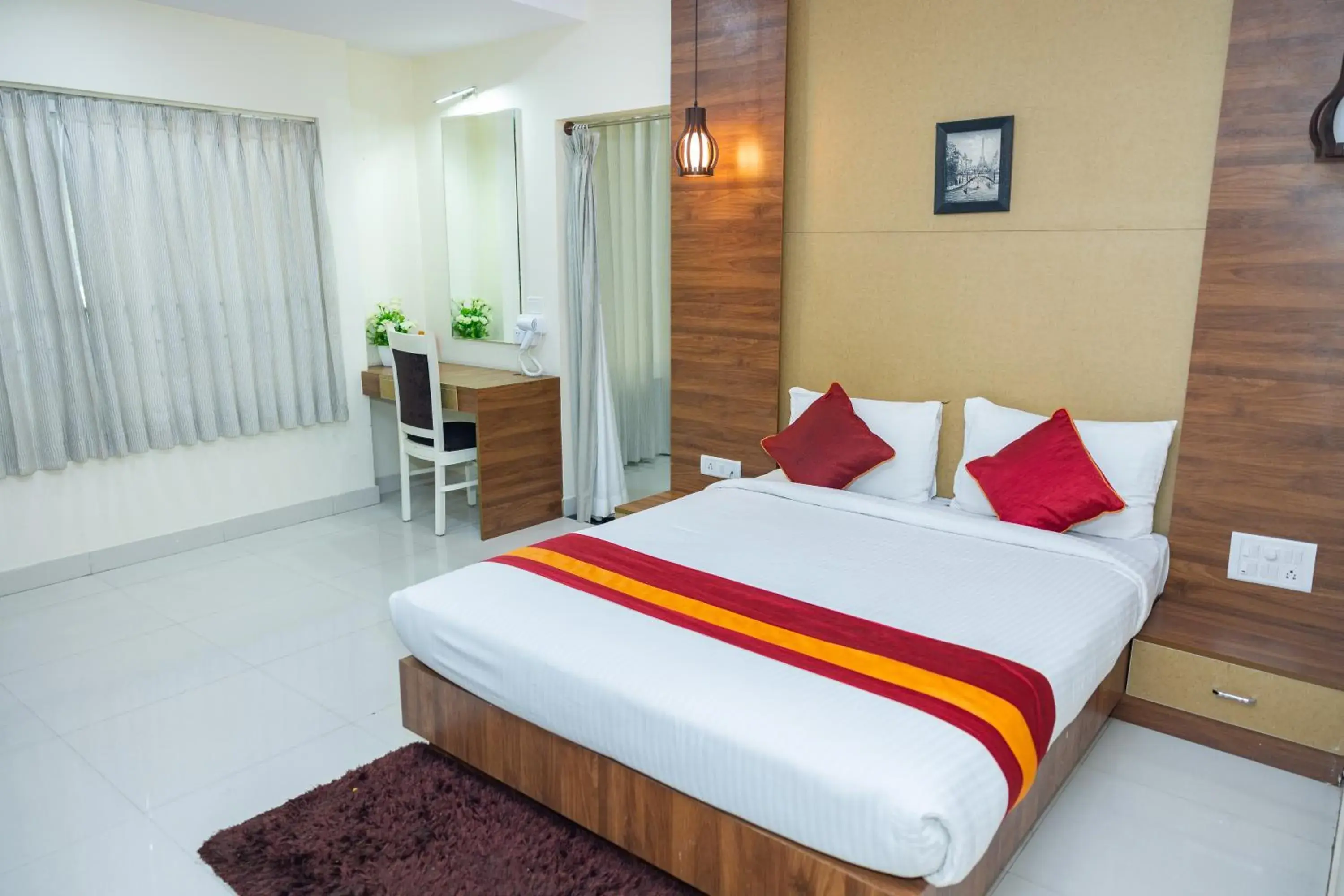 Bed in Ishwerya Suites Bed in Ishwerya Suites