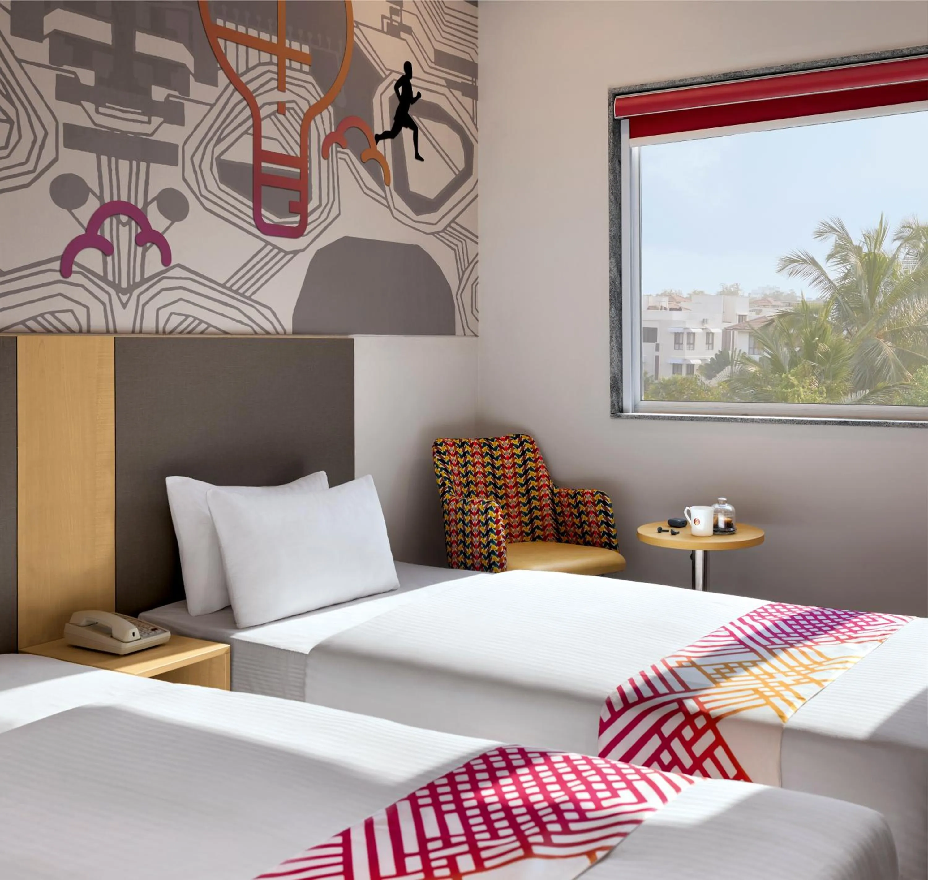 Seating area, Bed in Ginger Chennai OMR