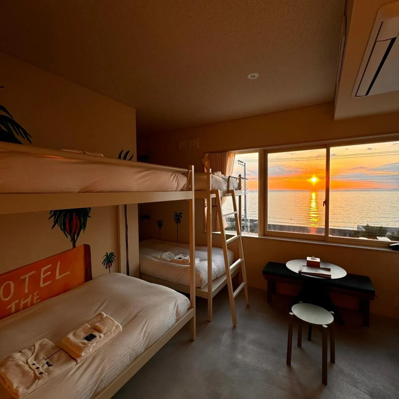 Bed in KAMOME SLOW HOTEL the COMPACT