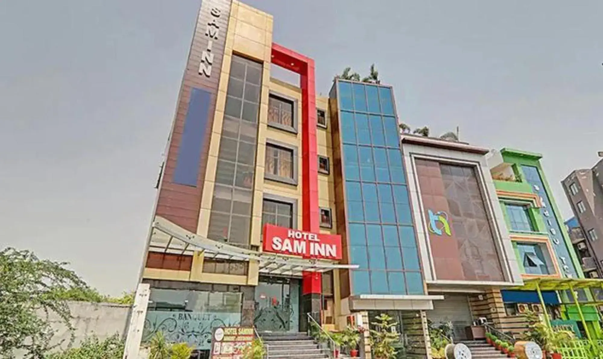 Property building in FabHotel Sam Inn Property building in FabHotel Sam Inn