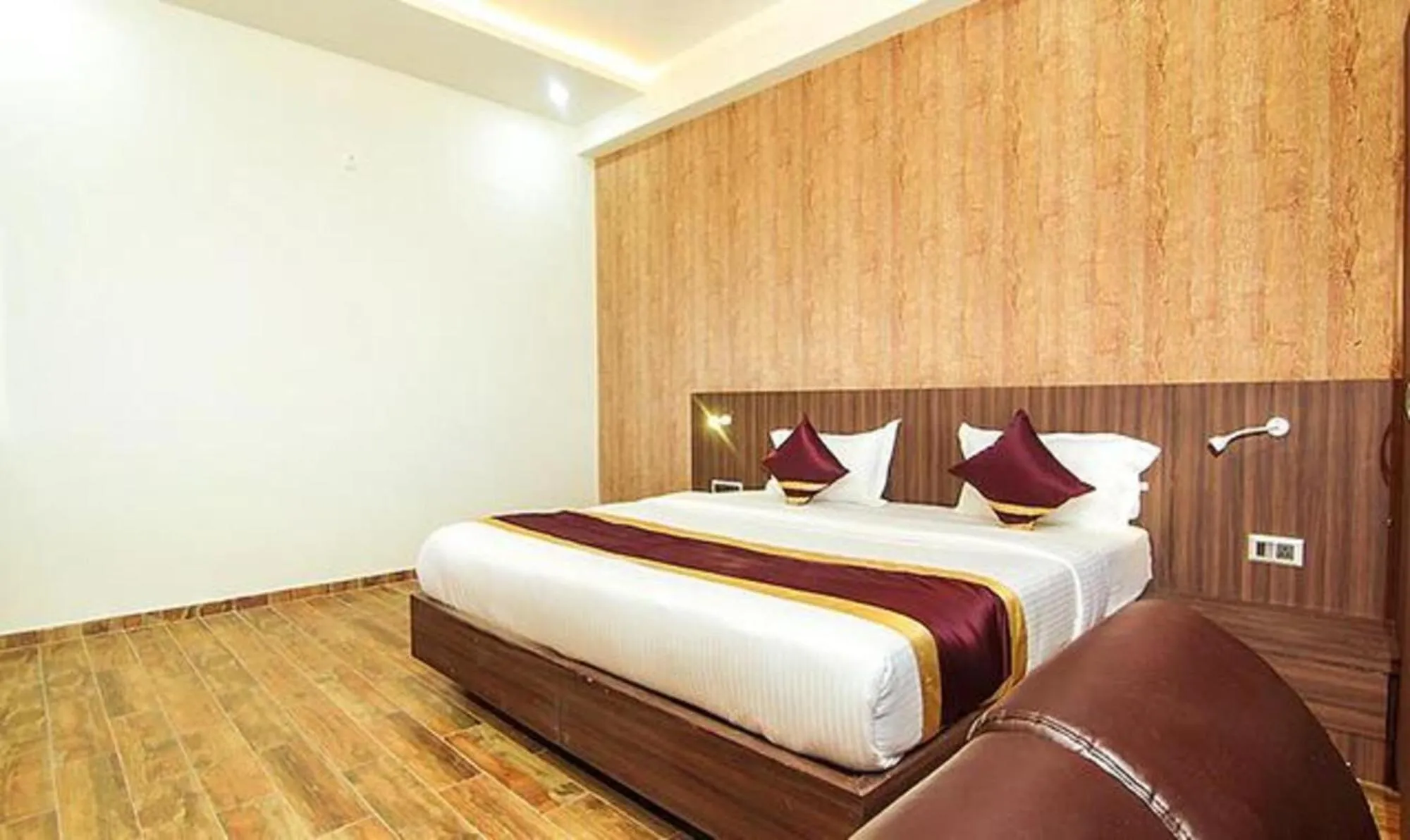 Bed in FabHotel Sam Inn