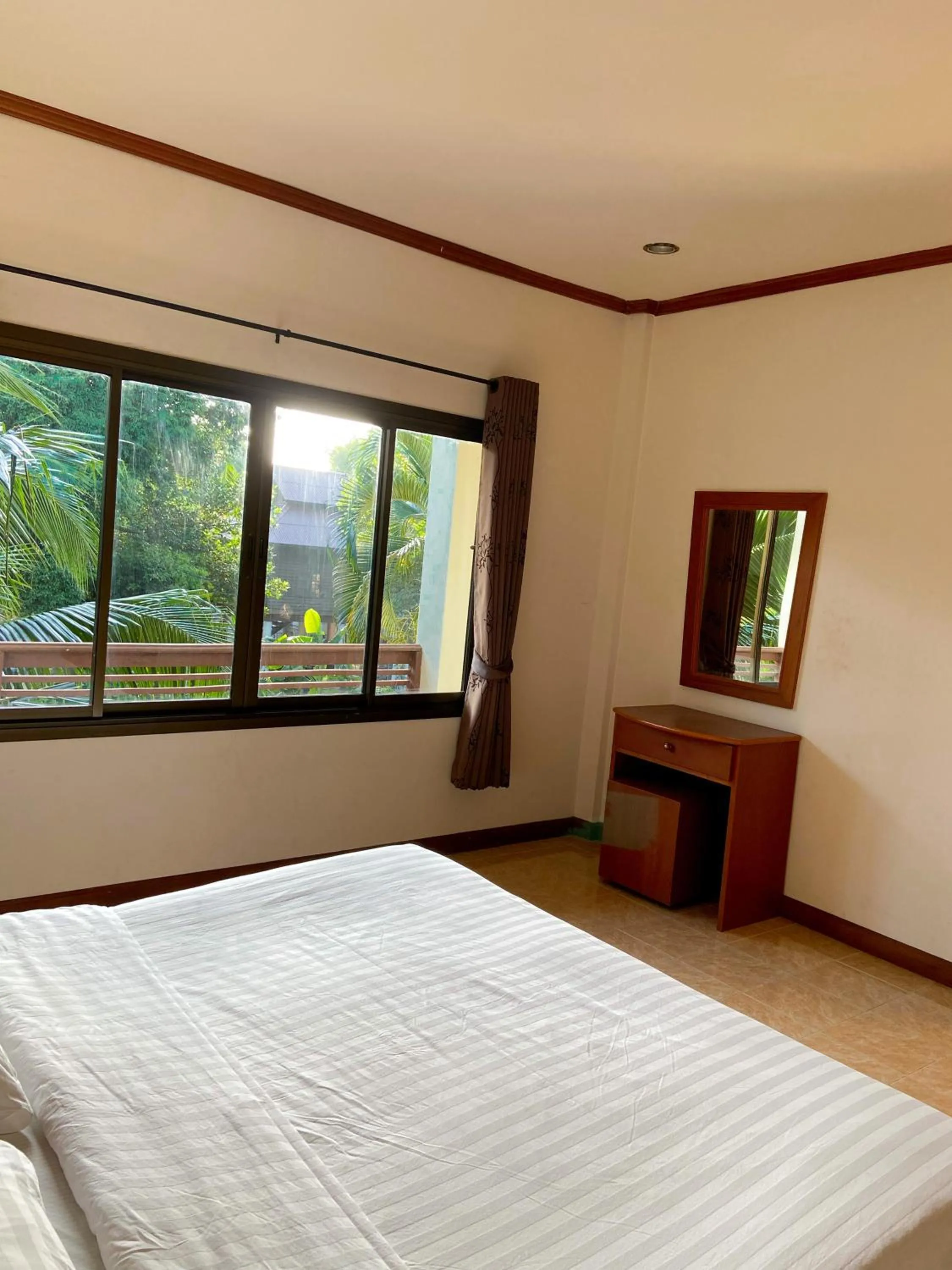 Bed in Baan srinimit Apartment