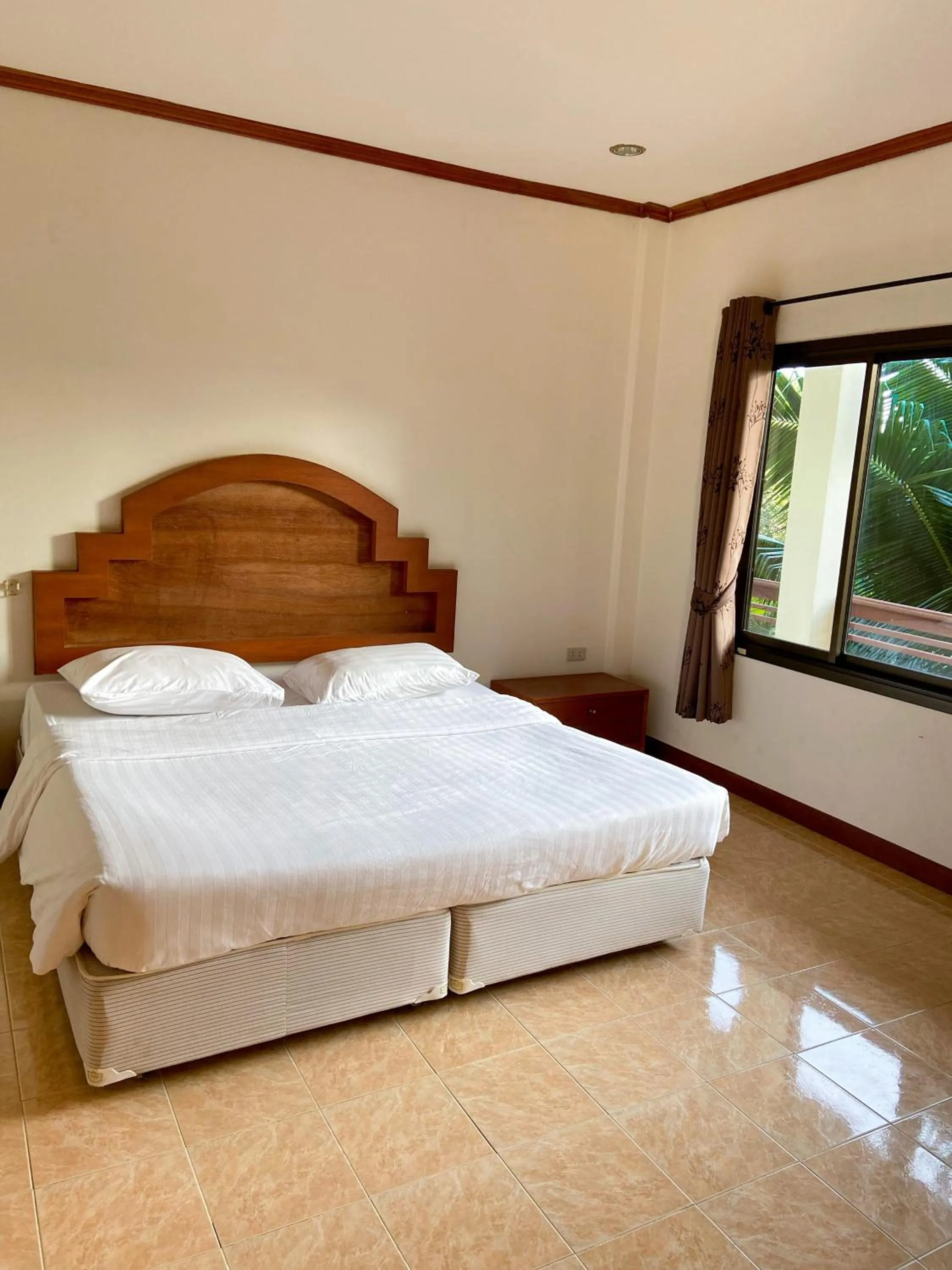 Bed in Baan srinimit Apartment