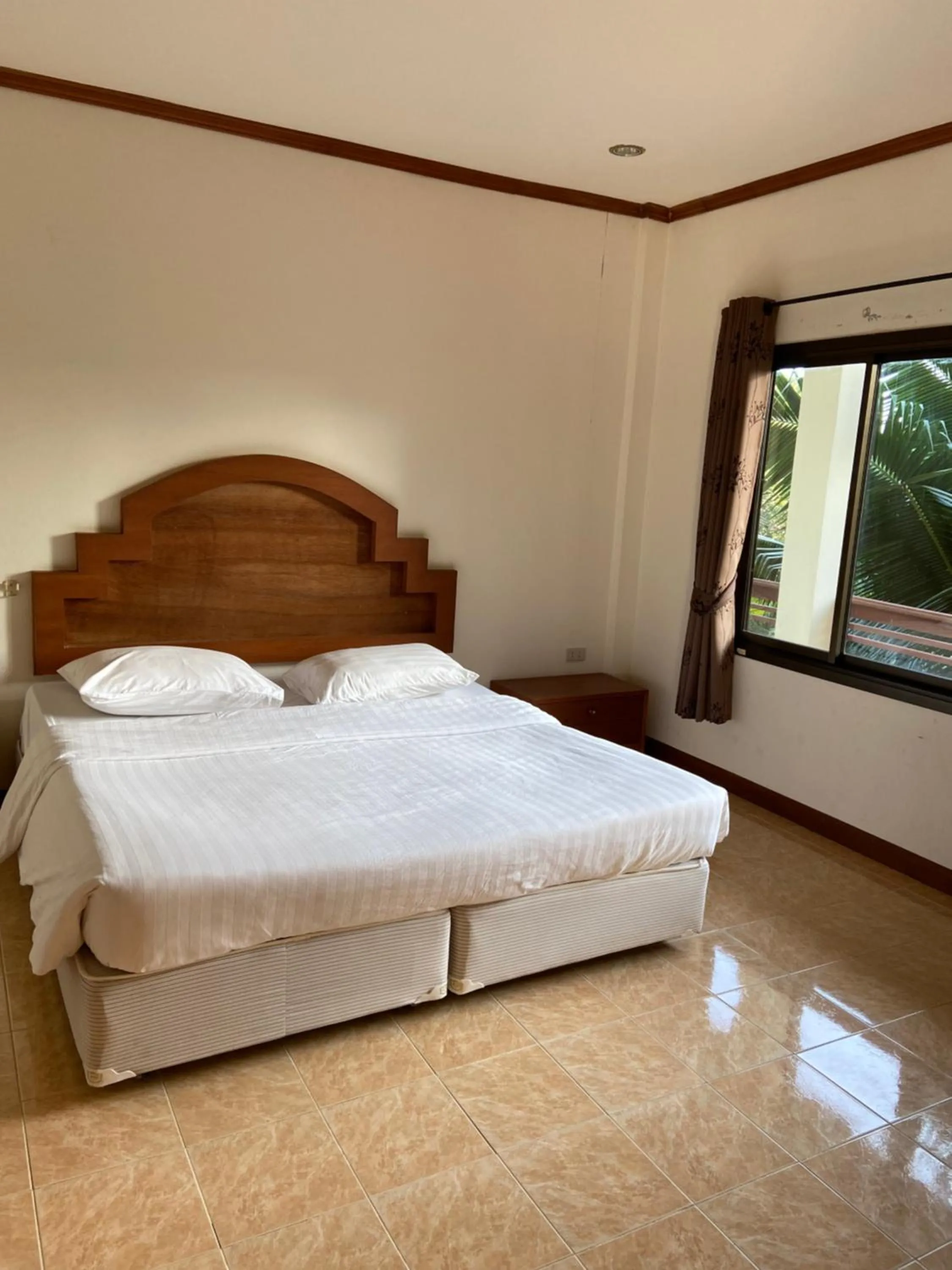 Bed in Baan srinimit Apartment