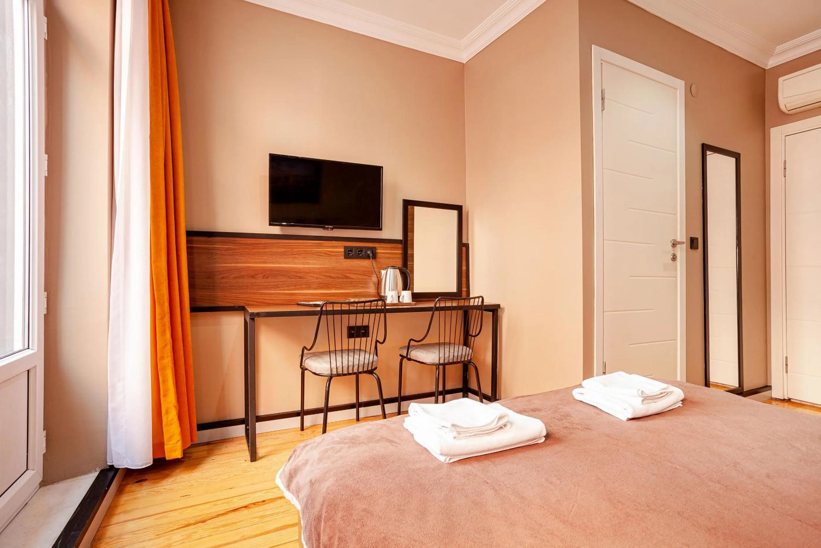 Bed in Aram Kerasi Rooms