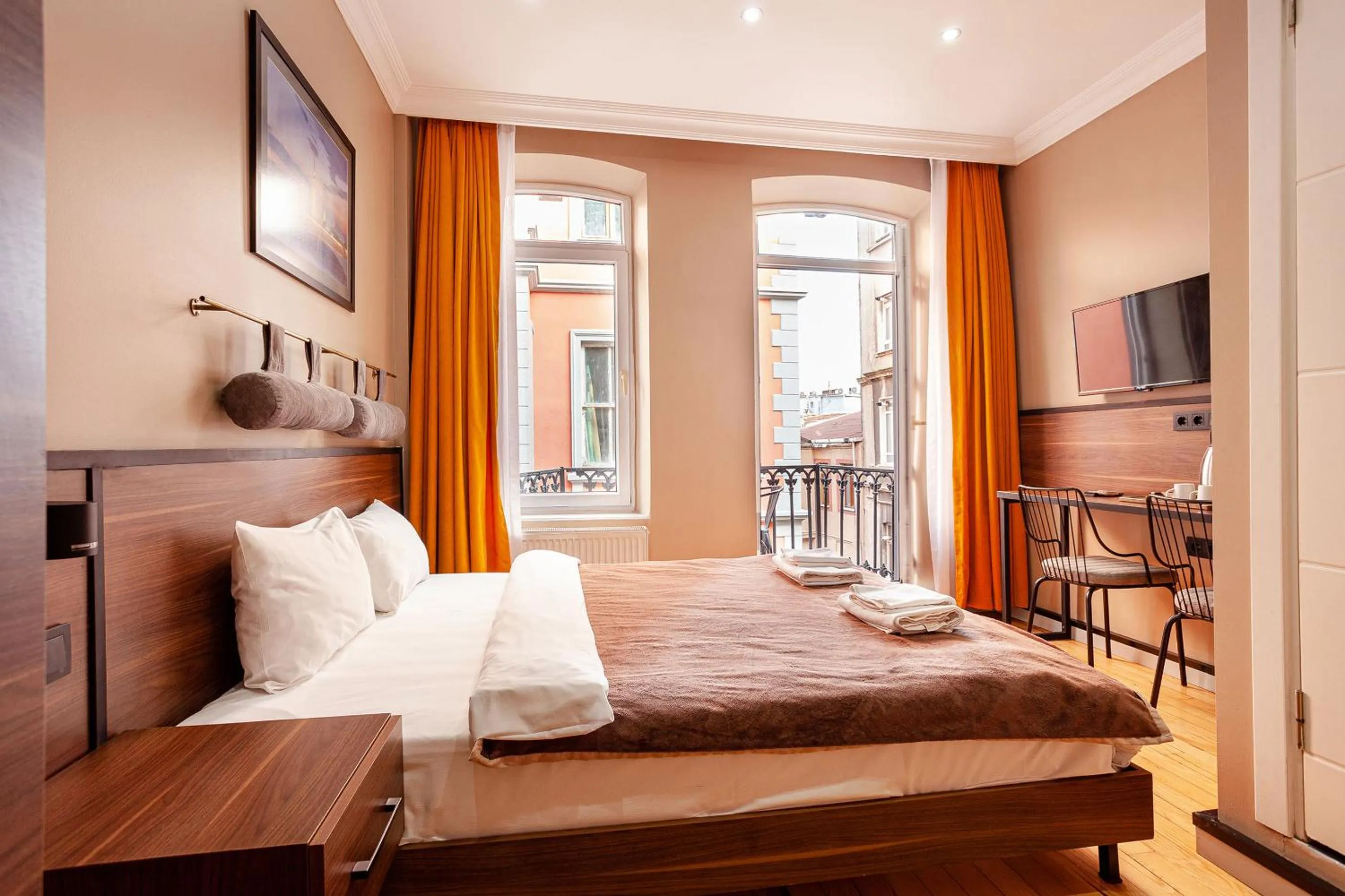 Bed in Aram Kerasi Rooms