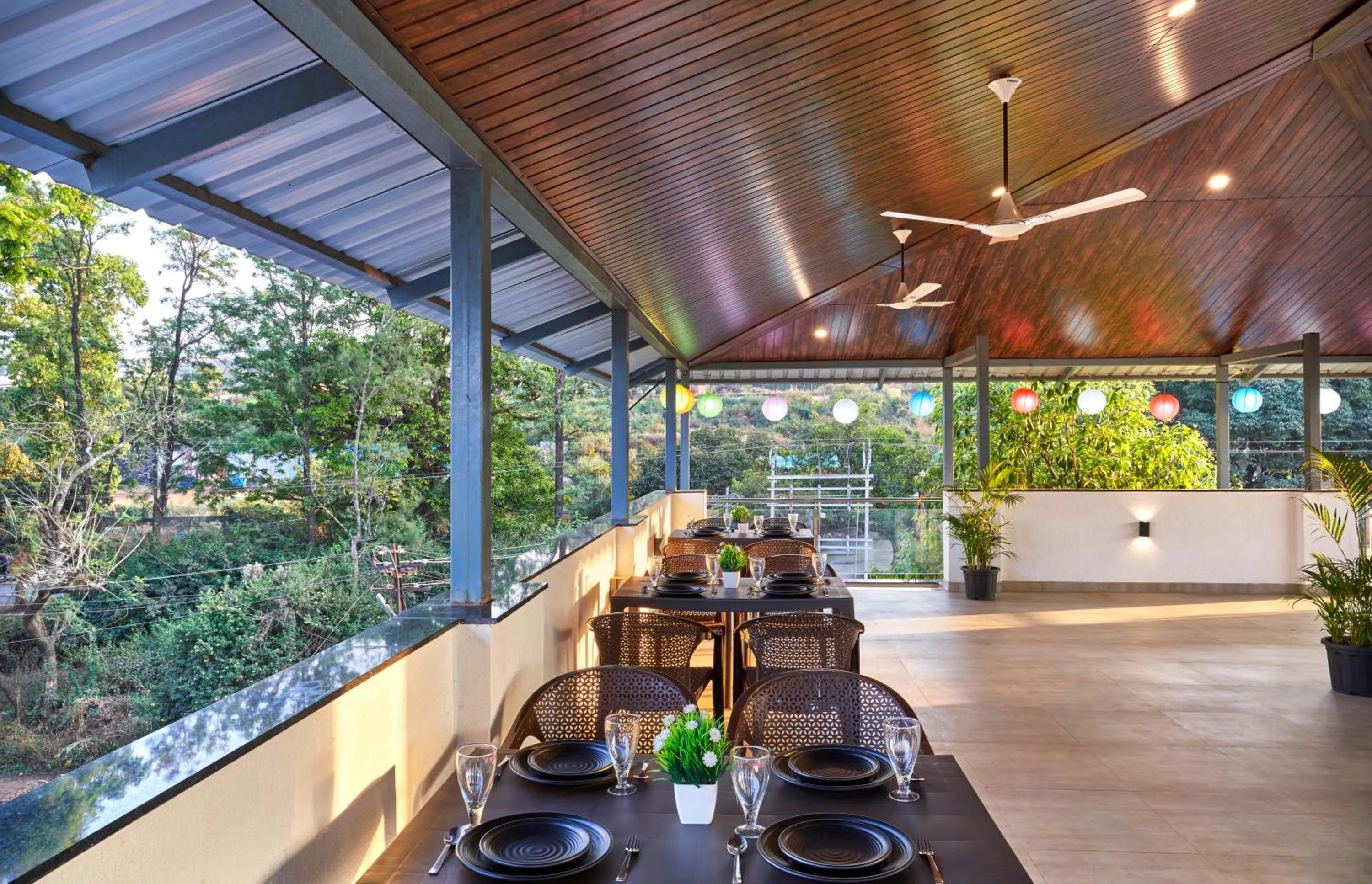 Dining area in Drizzle Resort with Swimming pool Near Maapro Garden