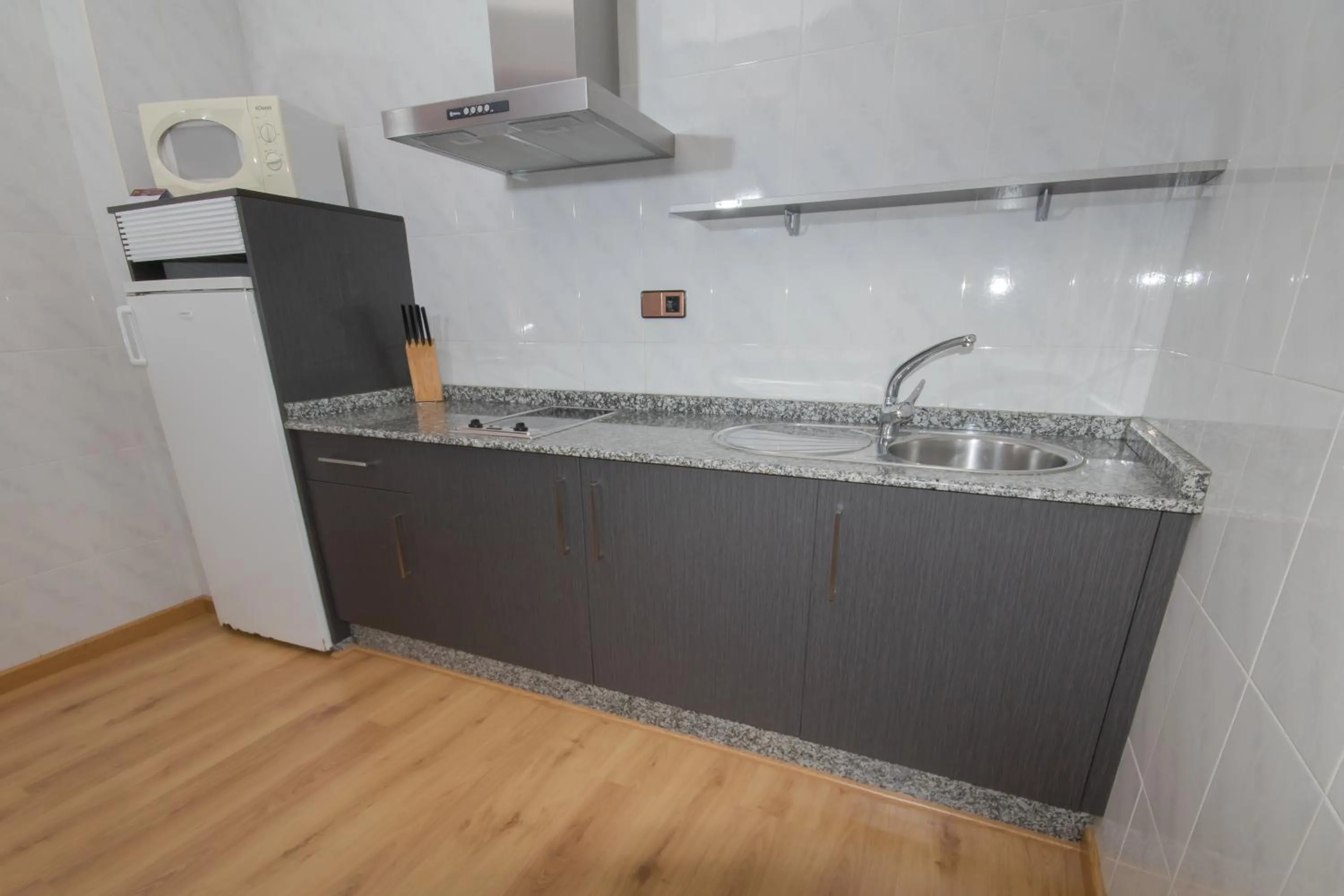 Kitchen or kitchenette in Hotel Spa Nanin Playa