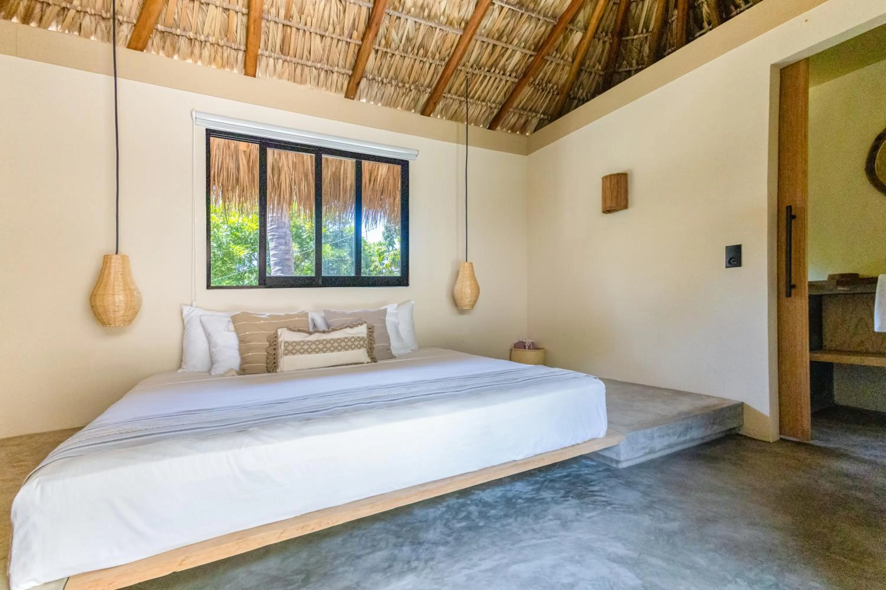 Bed in Raíz Hotel Boutique