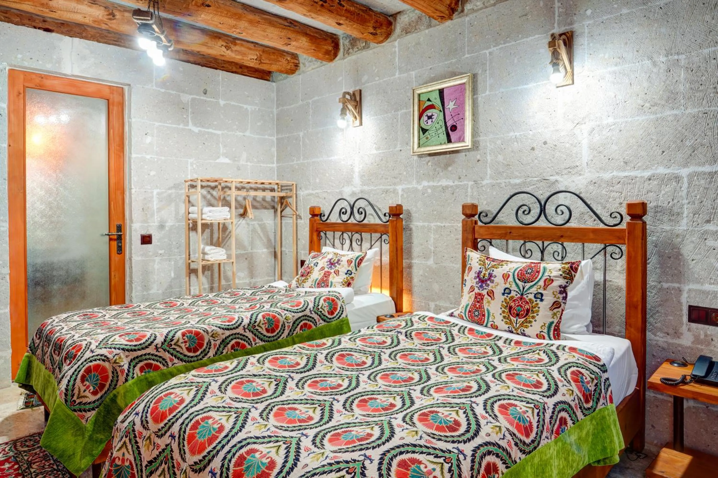 Bed in Atax Cave House