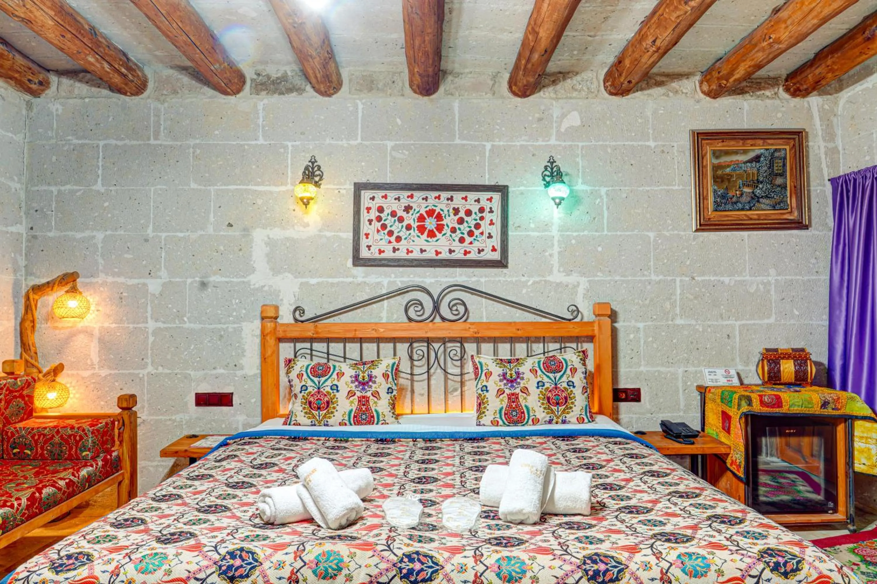 Bed in Atax Cave House