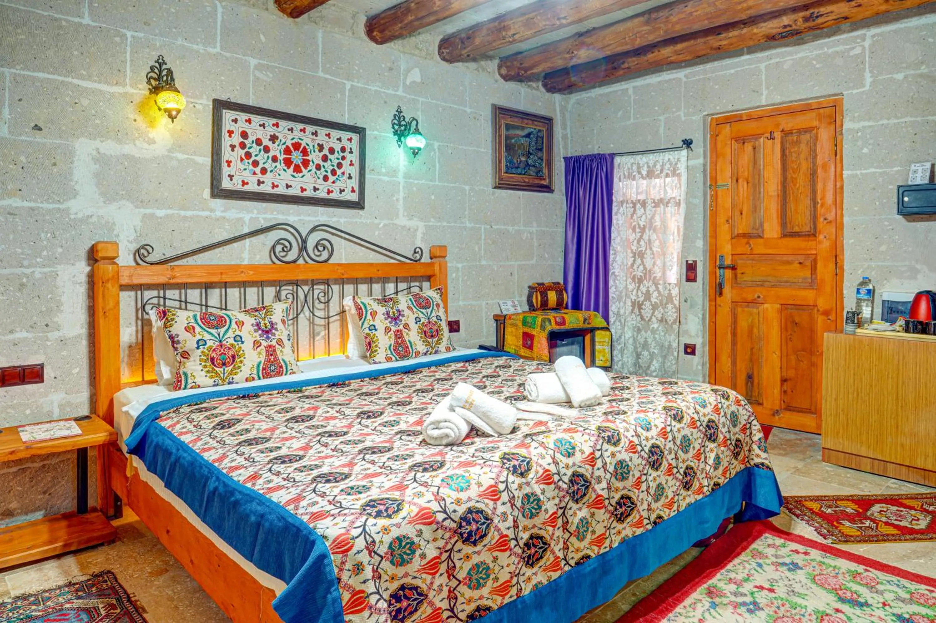 Bed in Atax Cave House
