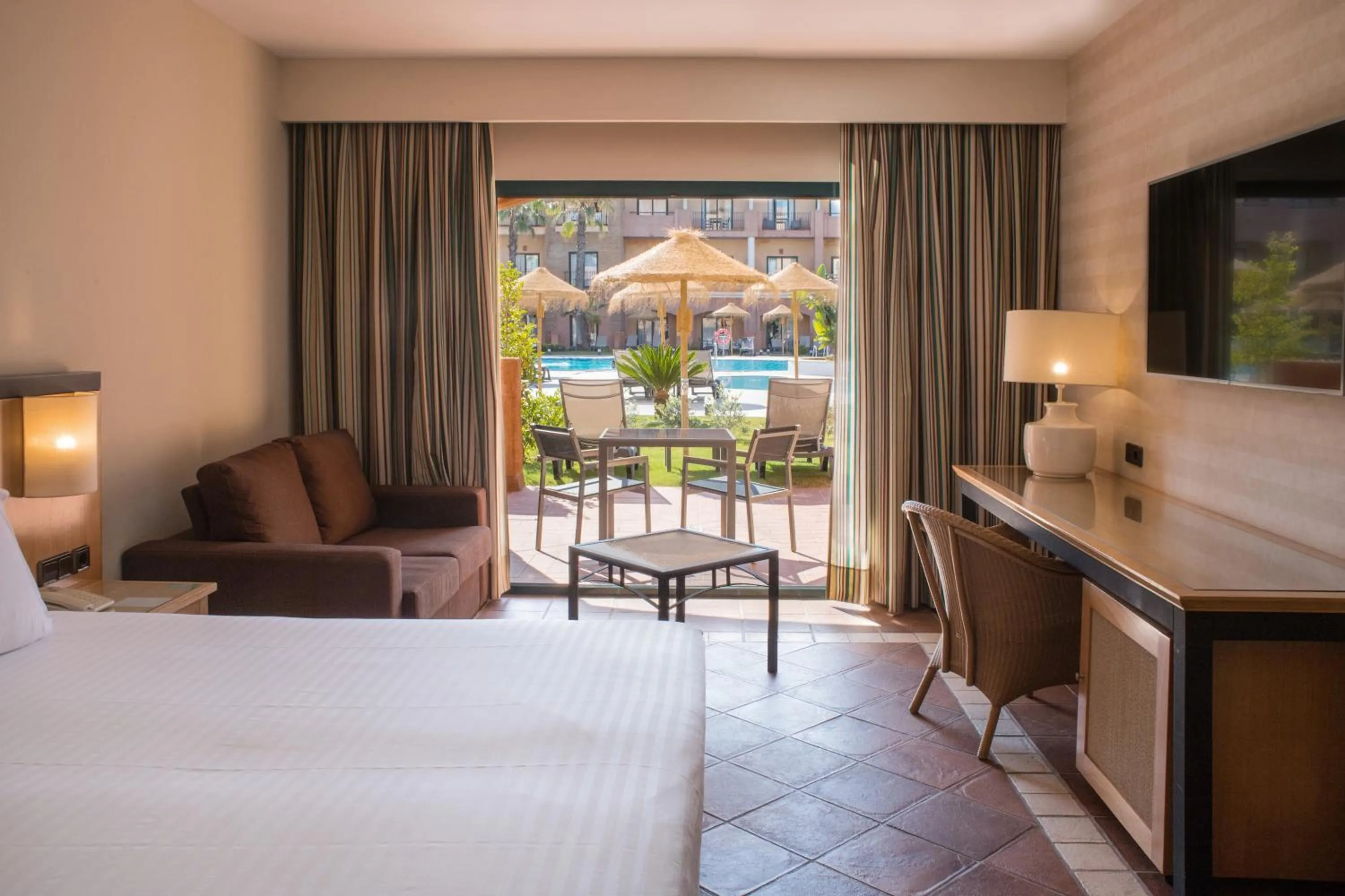 Garden view, Bed in Barceló Punta Umbría Mar