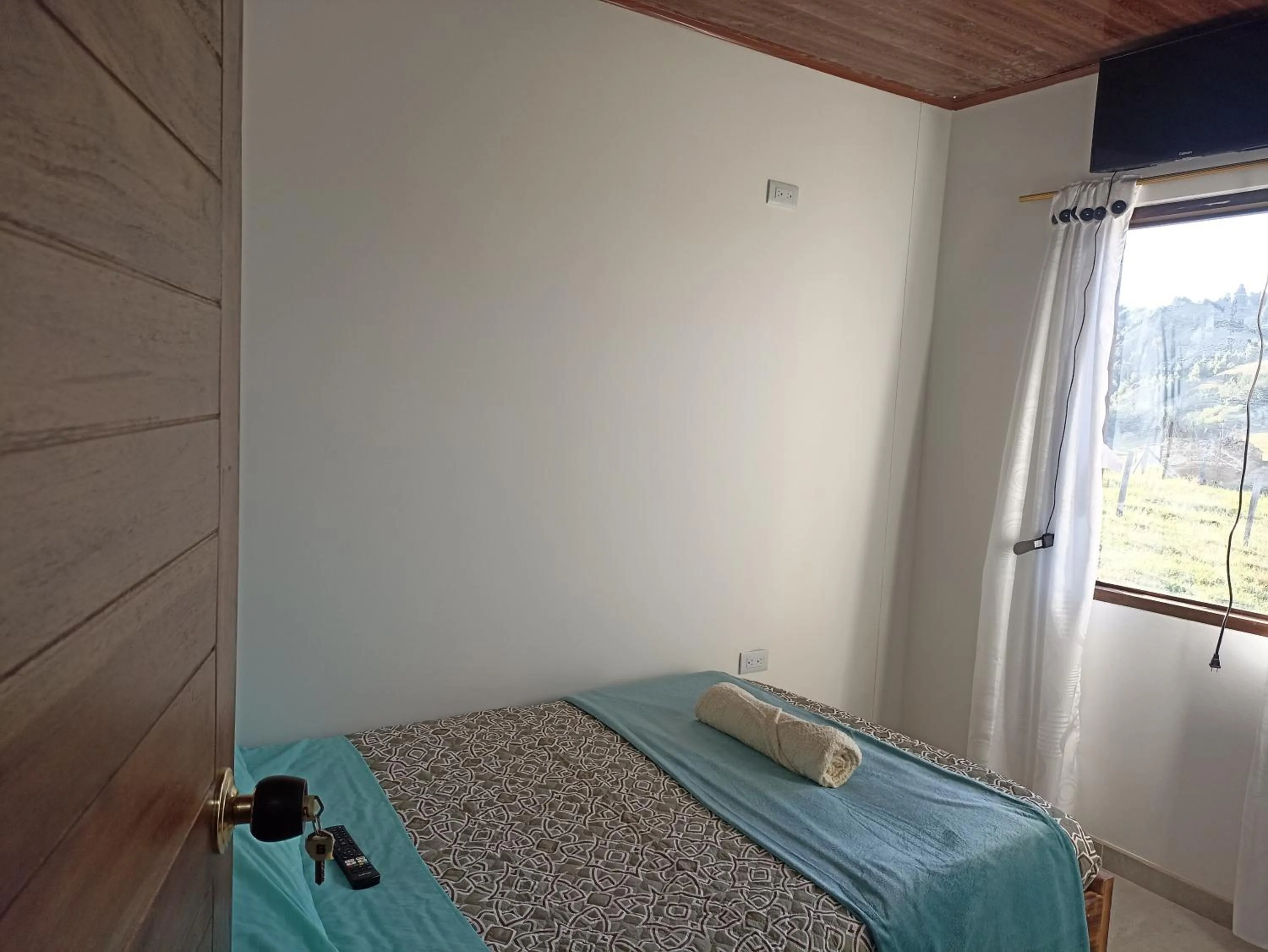 Bed in HOTEL TOTA ELISEO PLAYA BLANCA LAGO DE TOTA