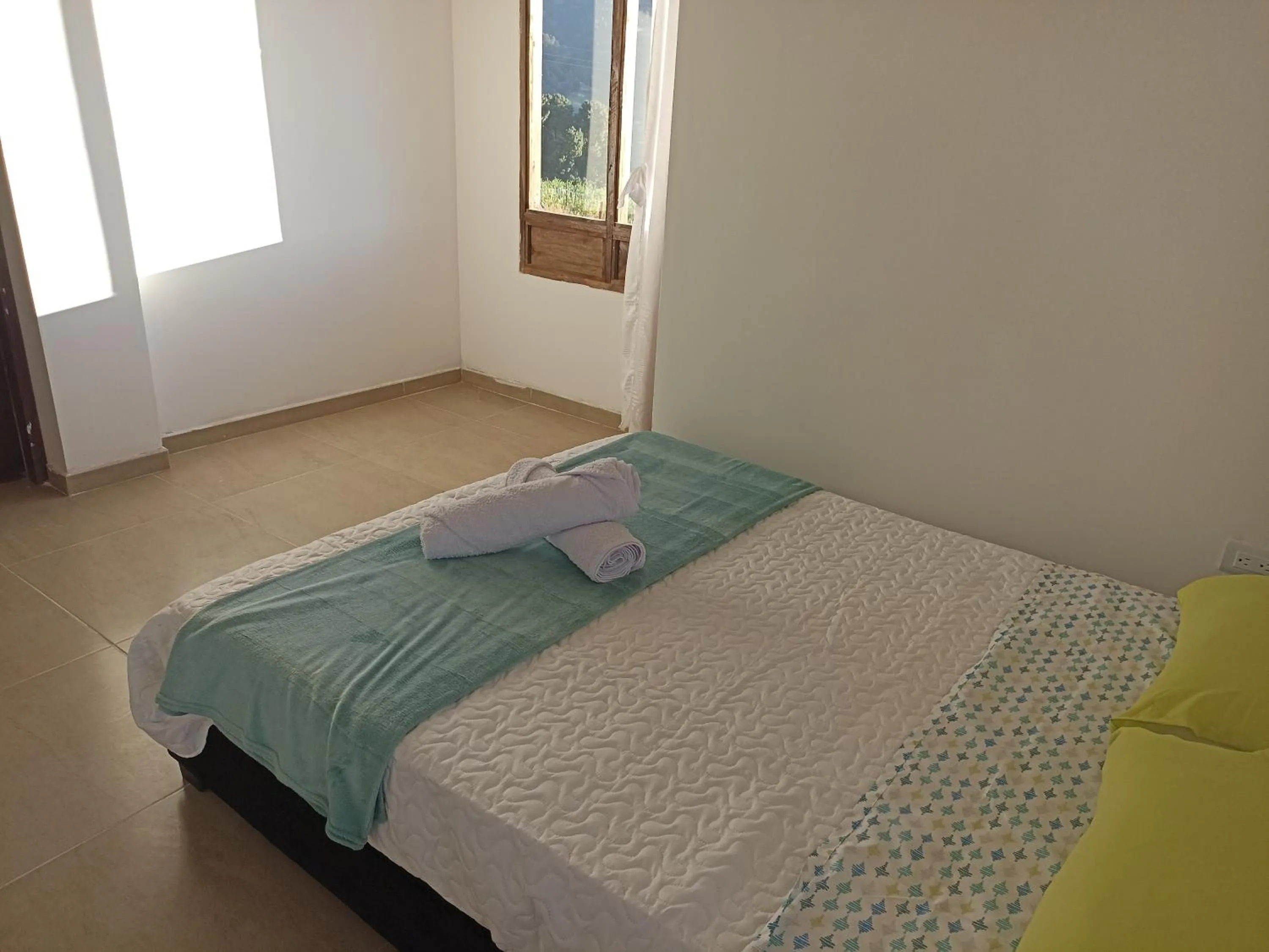 Bed in HOTEL TOTA ELISEO PLAYA BLANCA LAGO DE TOTA