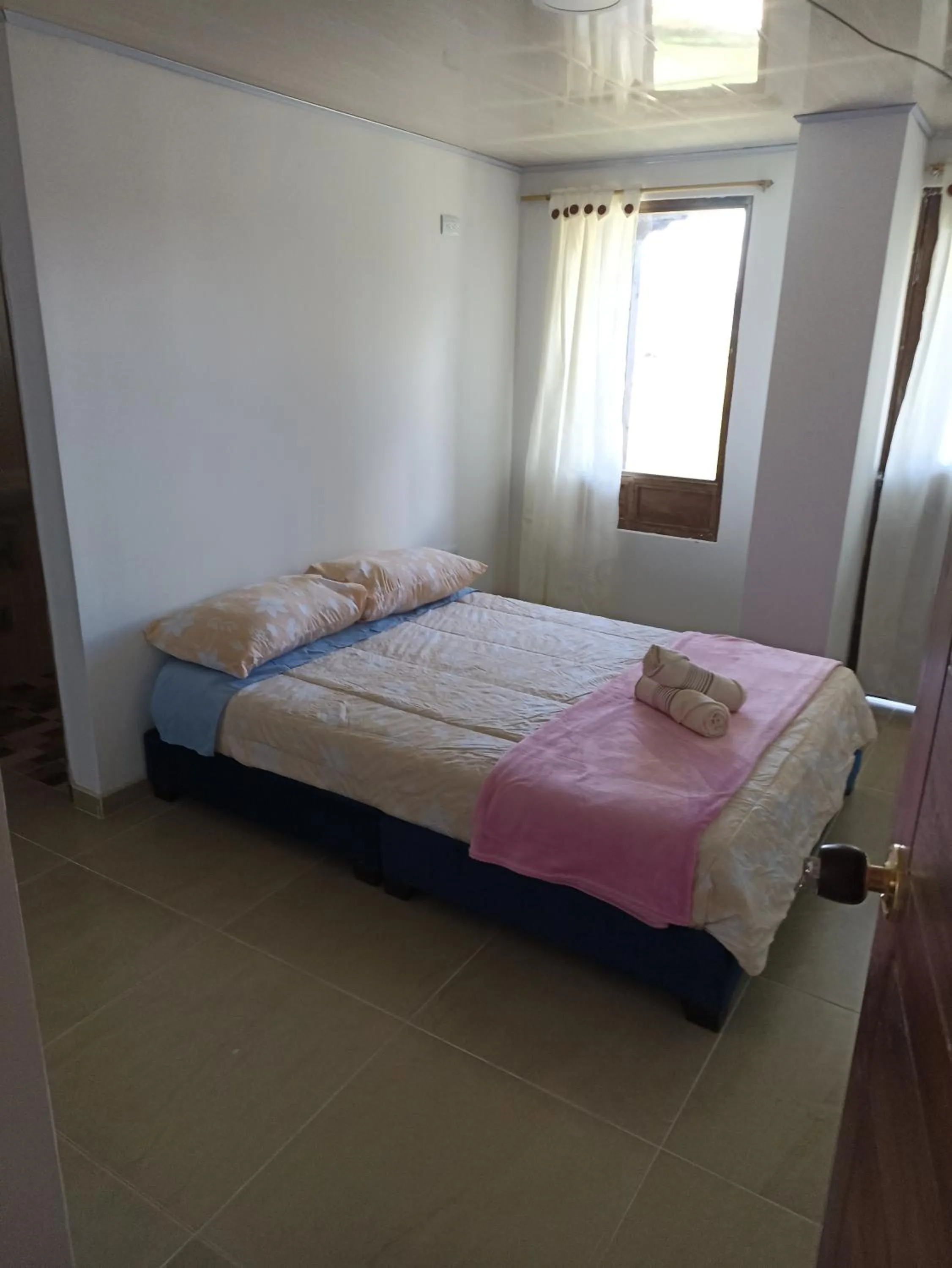 Bed in HOTEL TOTA ELISEO PLAYA BLANCA LAGO DE TOTA