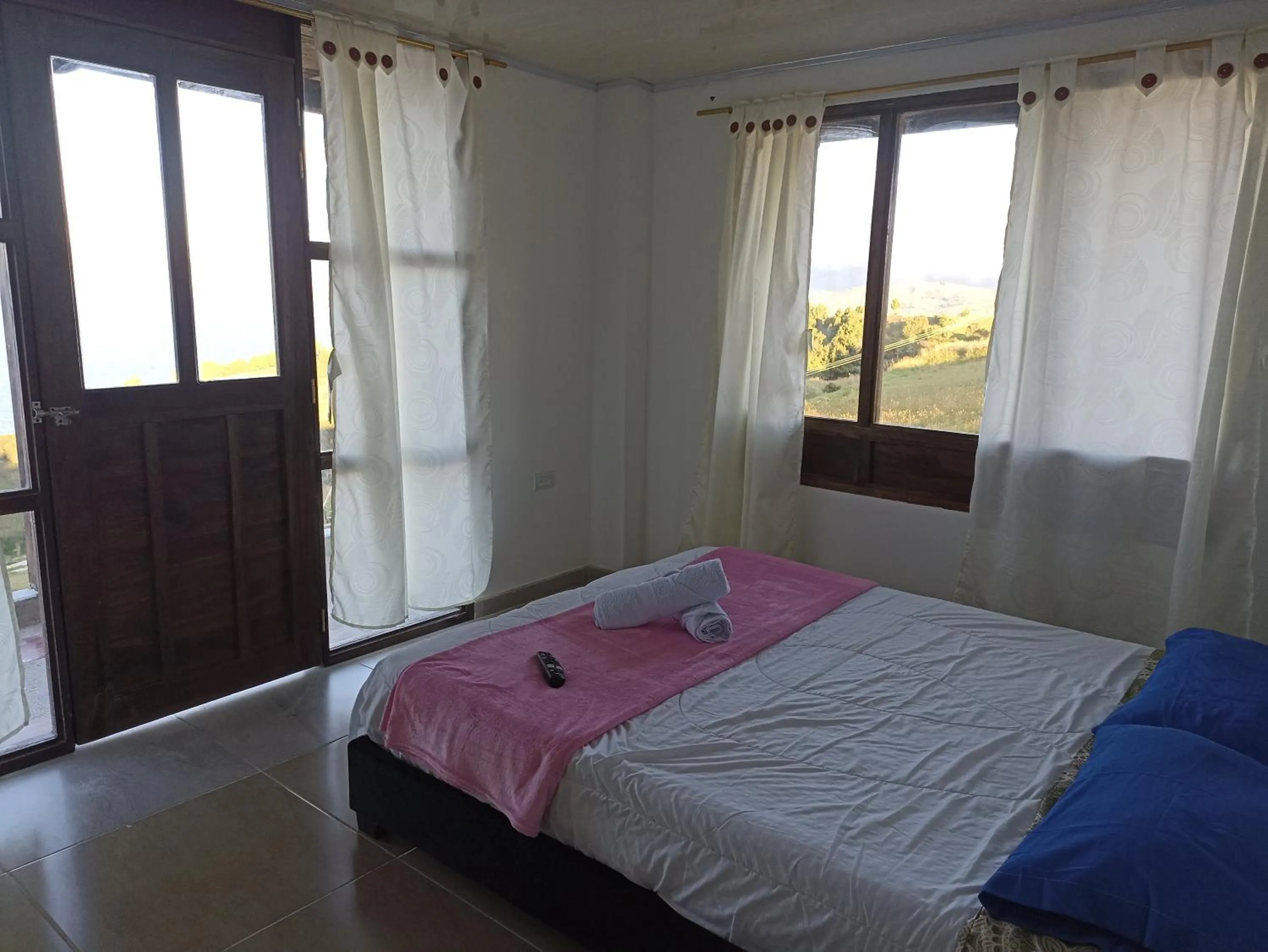 Bed in HOTEL TOTA ELISEO PLAYA BLANCA LAGO DE TOTA