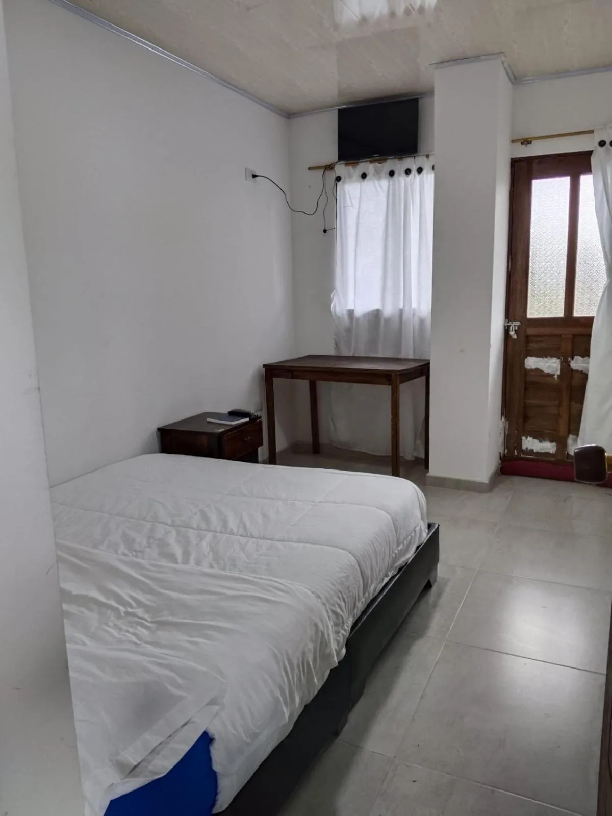 Bed in HOTEL TOTA ELISEO PLAYA BLANCA LAGO DE TOTA