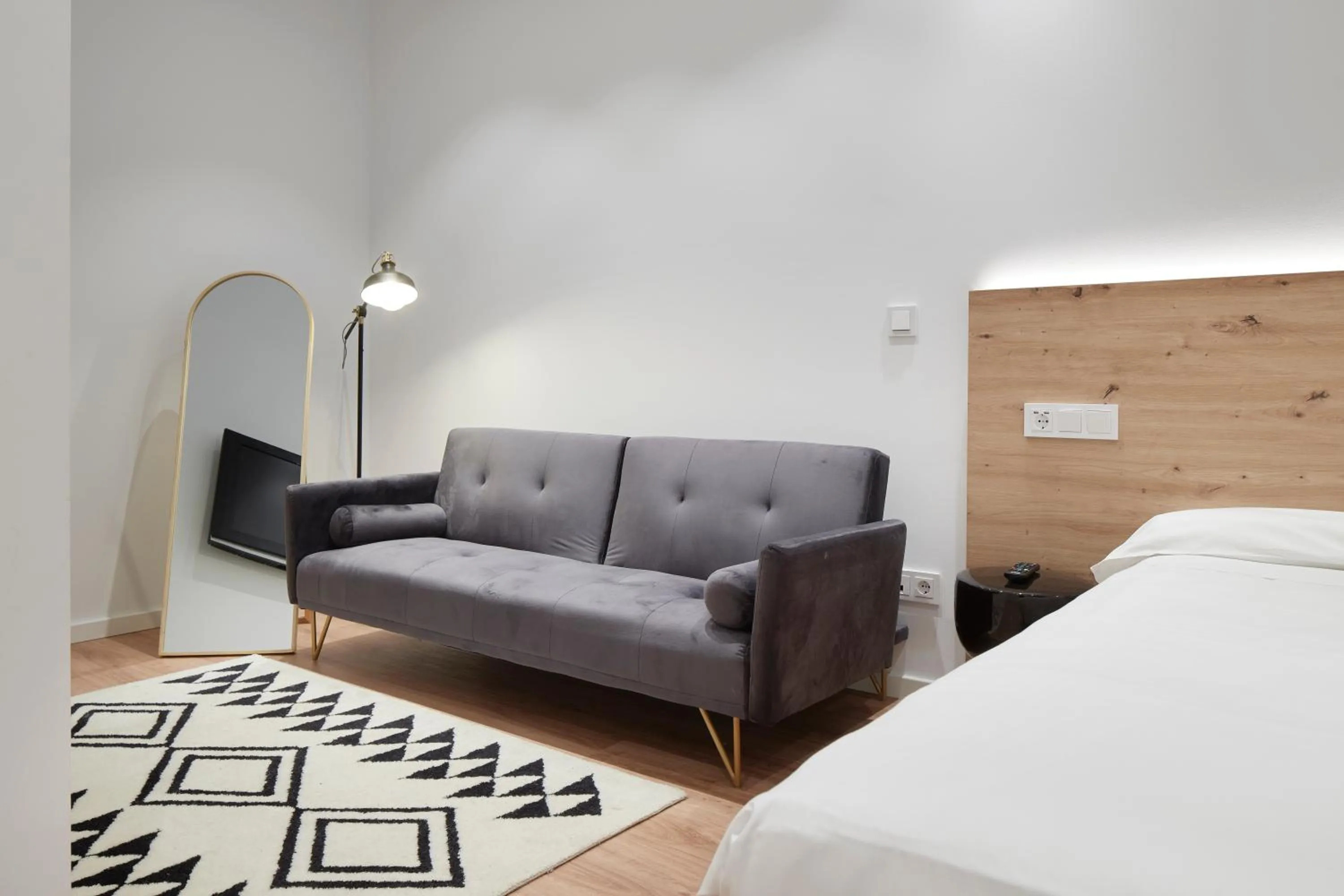 Seating area, Bed in Hotel Iriguibel Huarte Pamplona