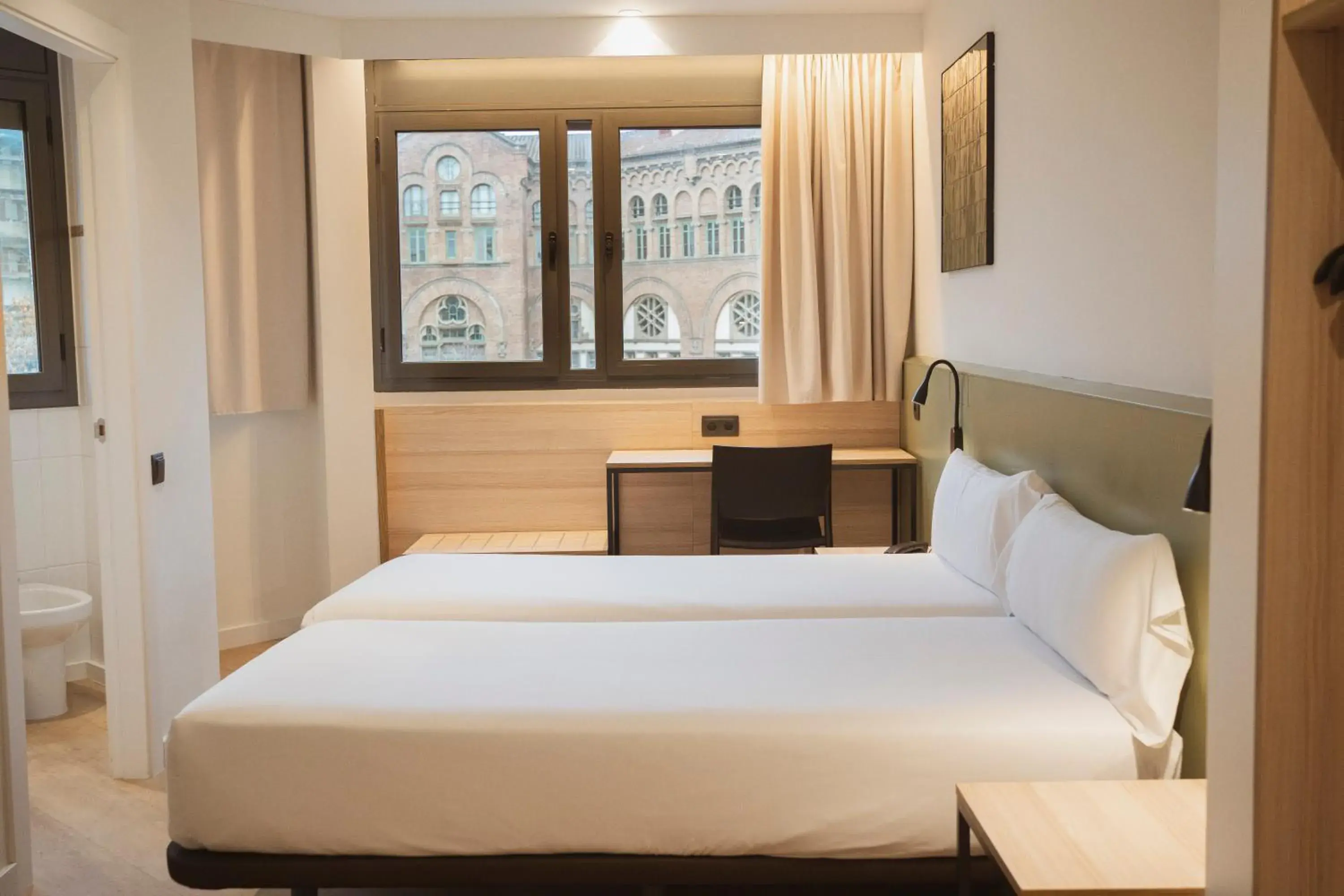 Bed in Hotel Sant Pau Bed in Hotel Sant Pau