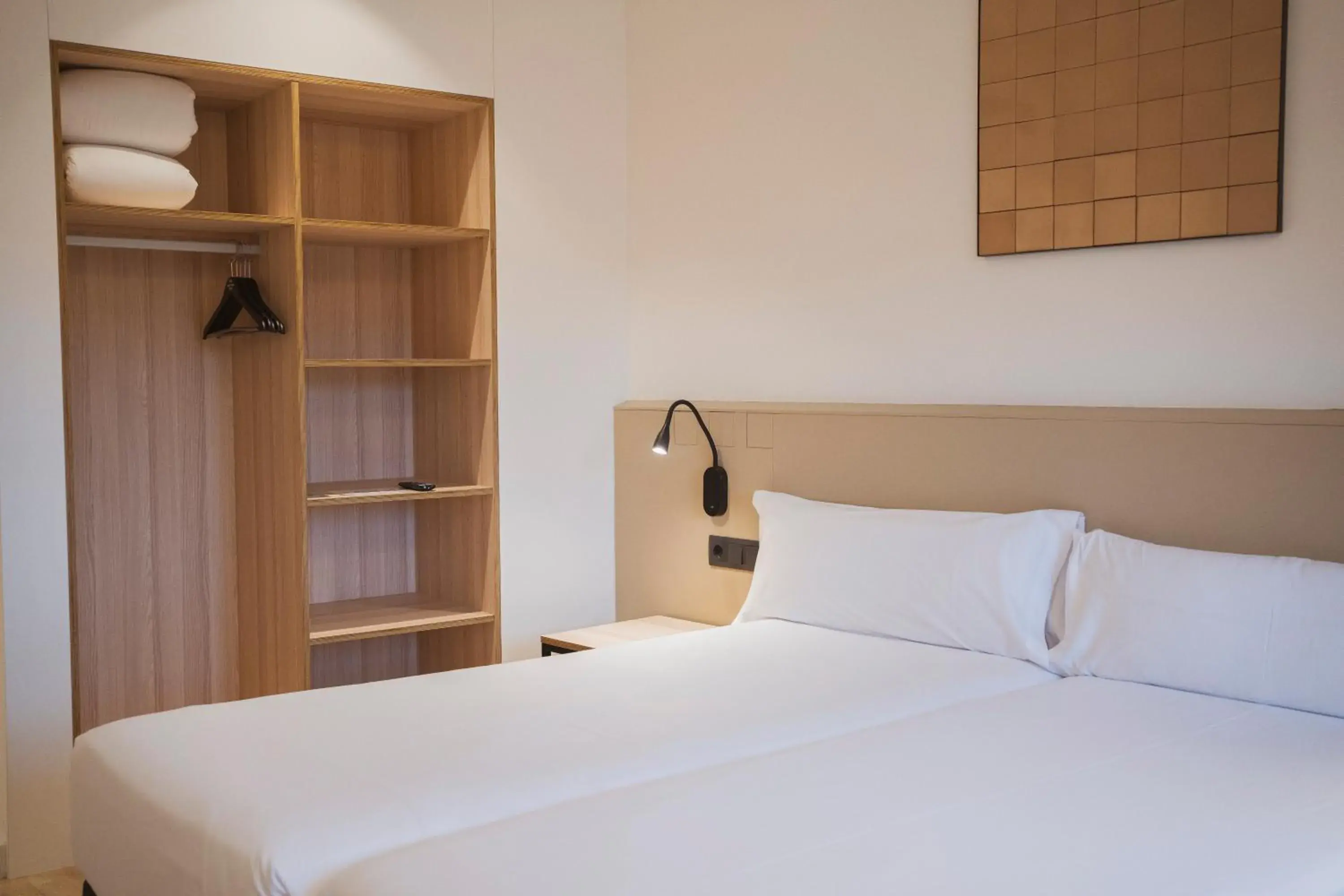 Bed in Hotel Sant Pau Bed in Hotel Sant Pau