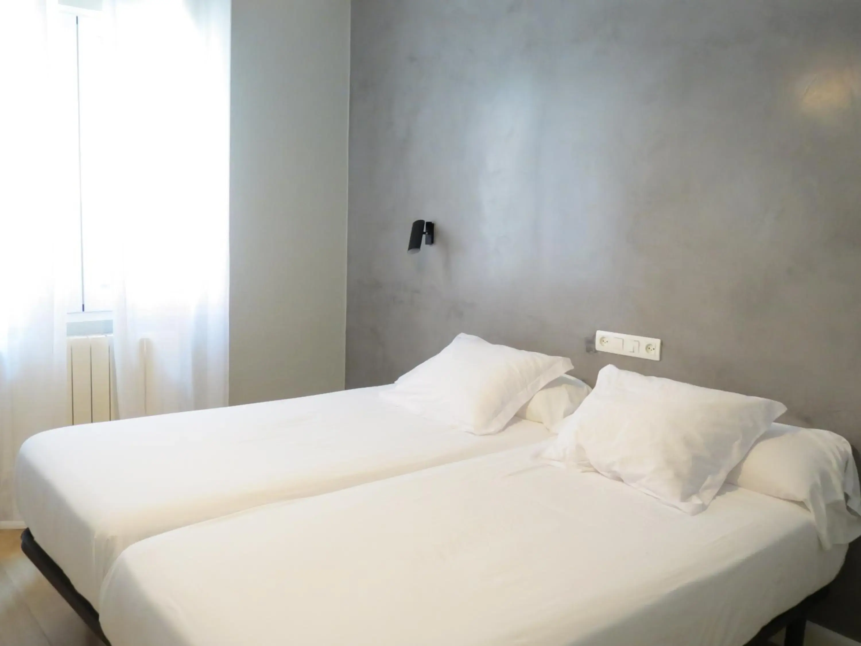 Bed in Pensión Don Claudio Bed in Pensión Don Claudio