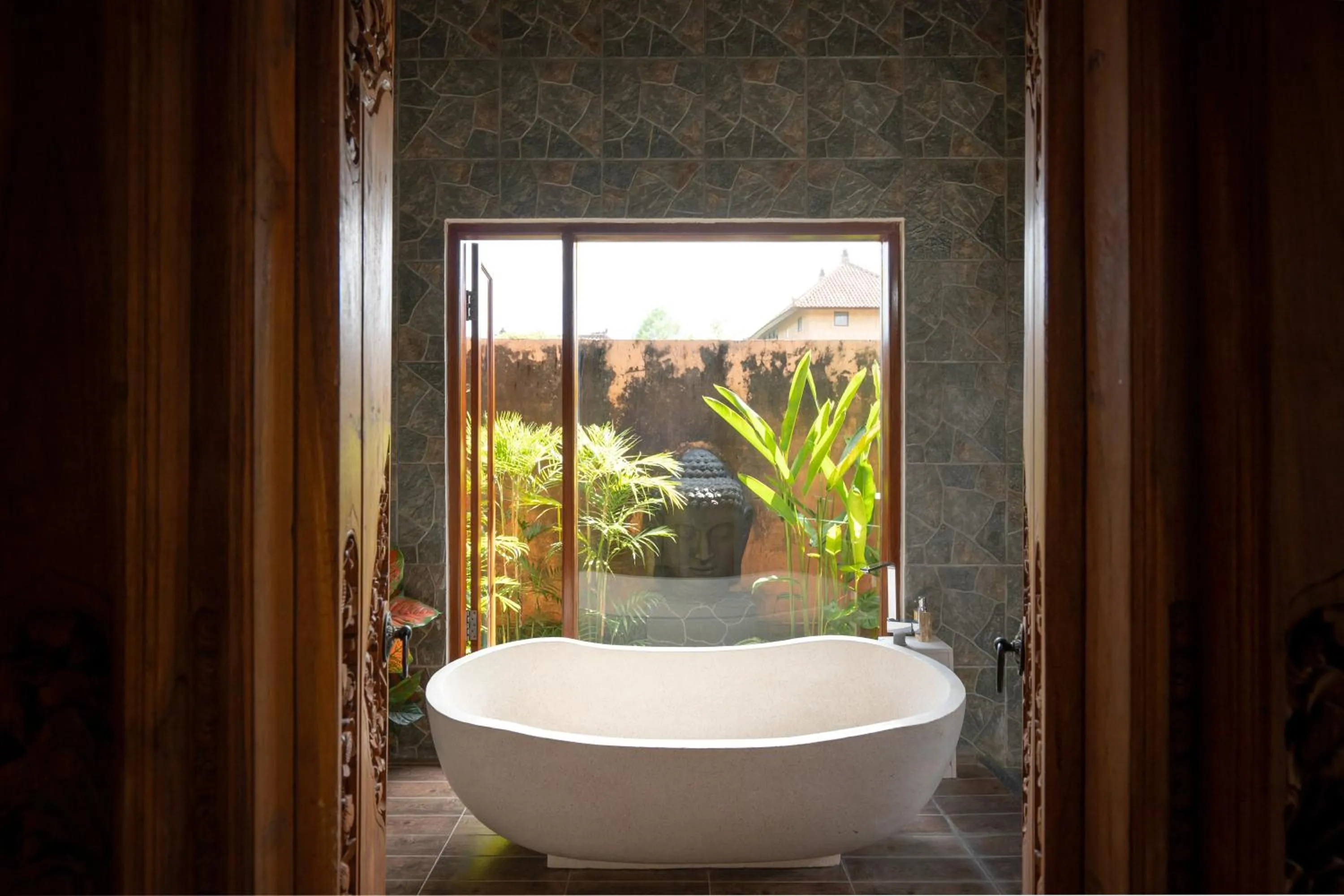 Bathroom in Genie Private Villa by Travellink Bali