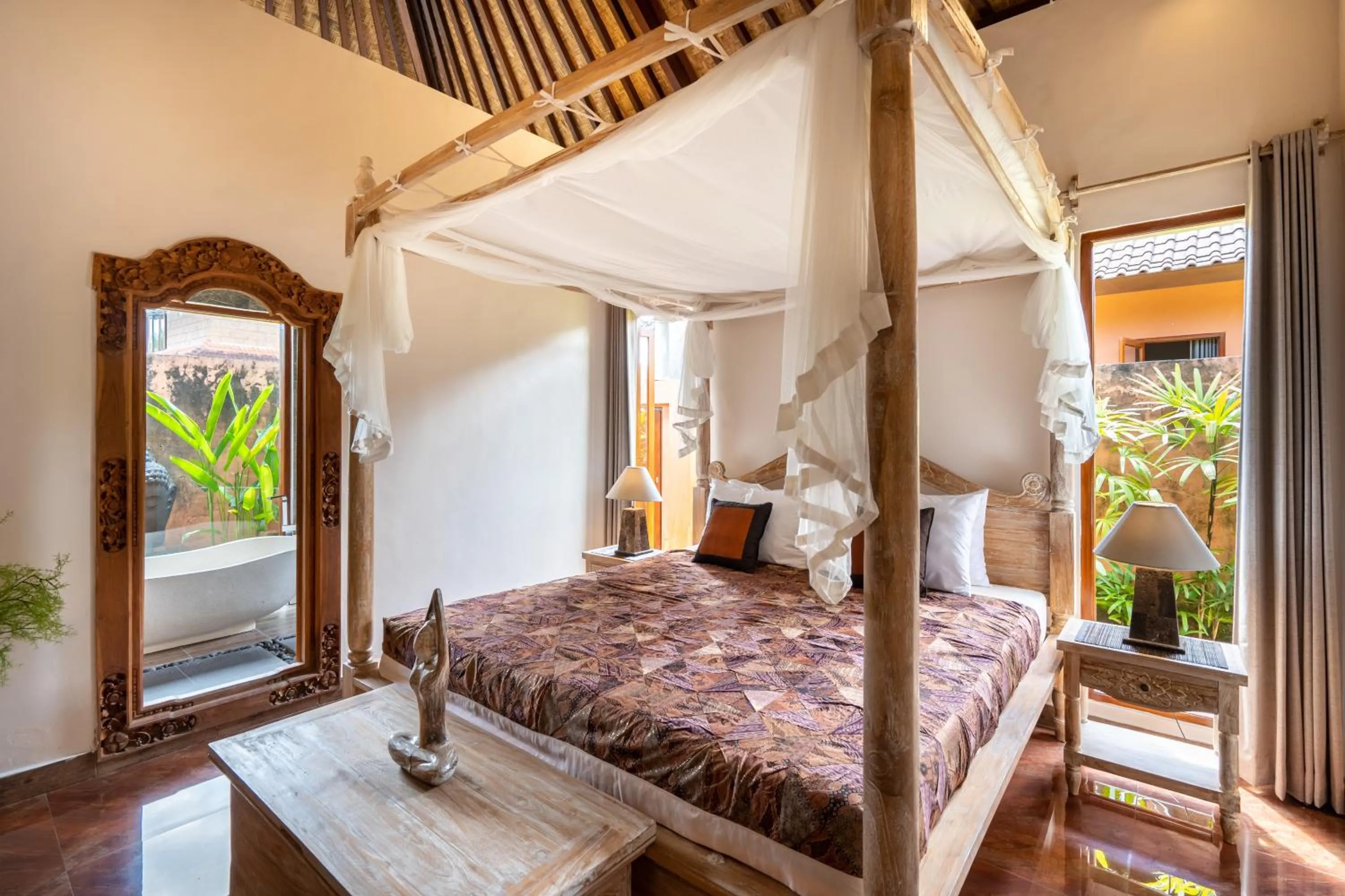 Bed in Genie Private Villa by Travellink Bali