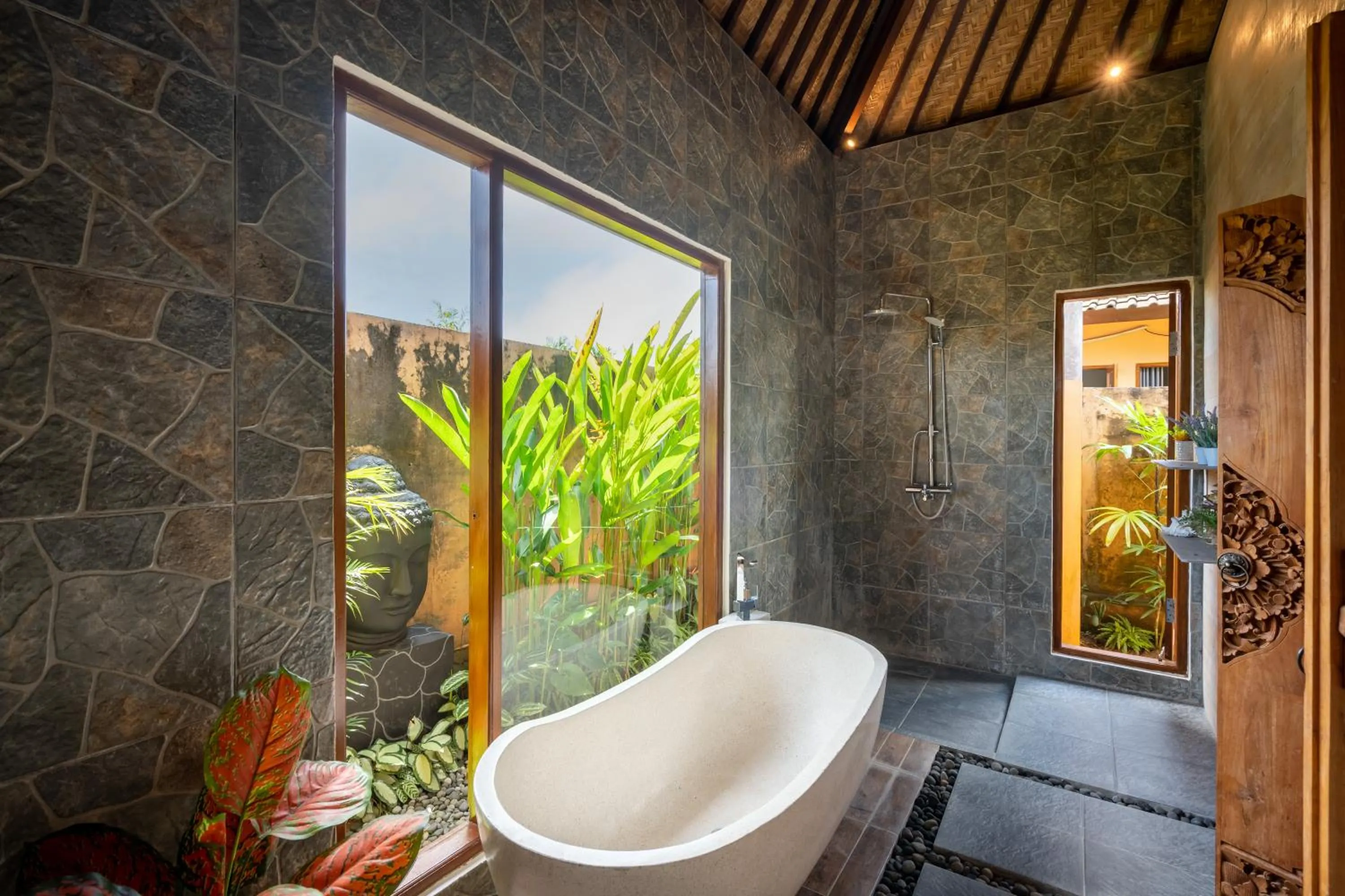 Bathroom in Genie Private Villa by Travellink Bali