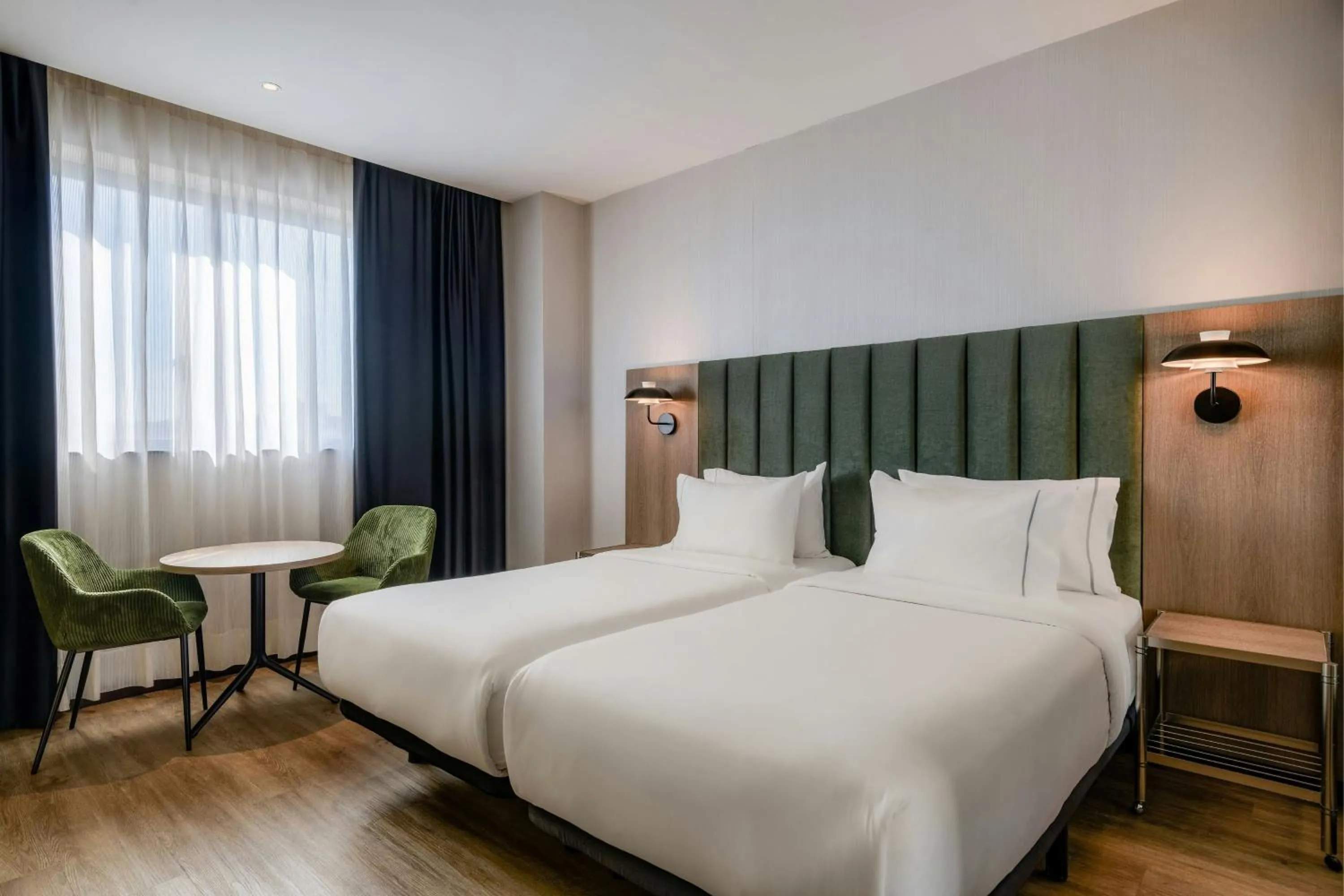 Photo of the whole room, Bed in AC Hotel Madrid Feria by Marriott