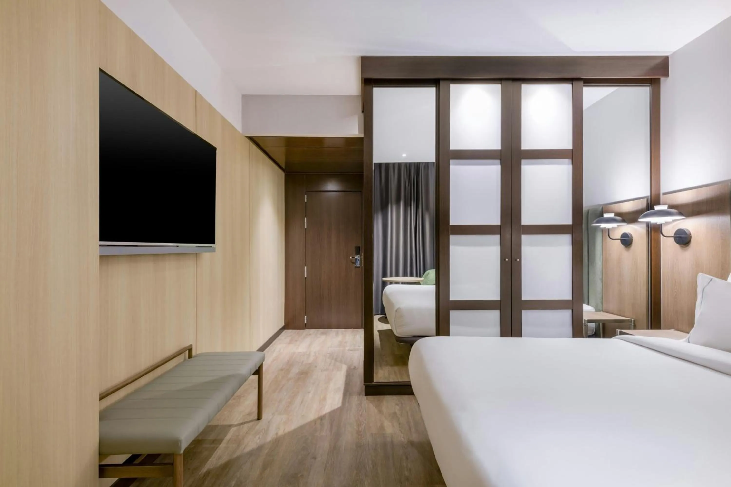 Photo of the whole room, Bed in AC Hotel Madrid Feria by Marriott