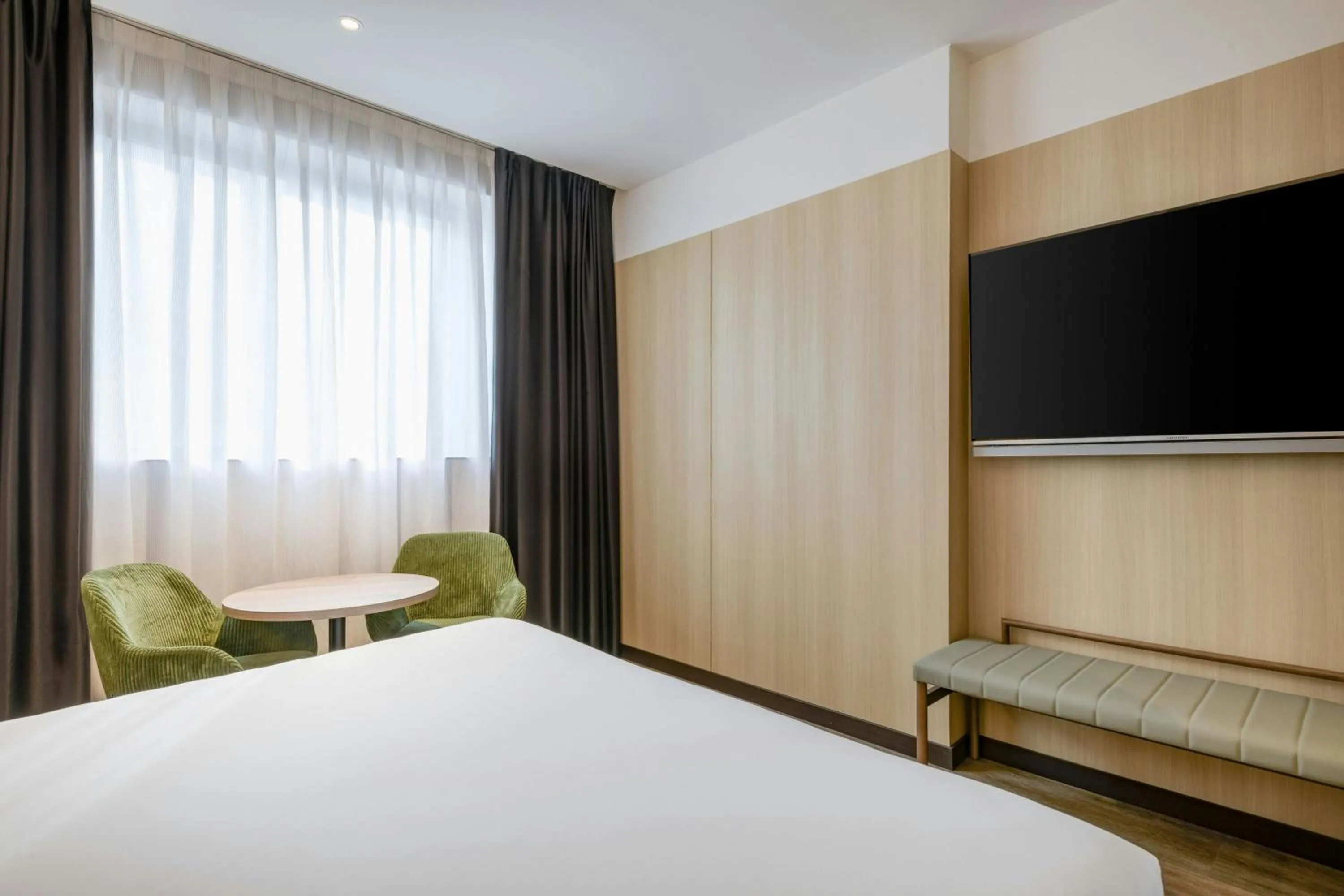 Photo of the whole room, Bed in AC Hotel Madrid Feria by Marriott