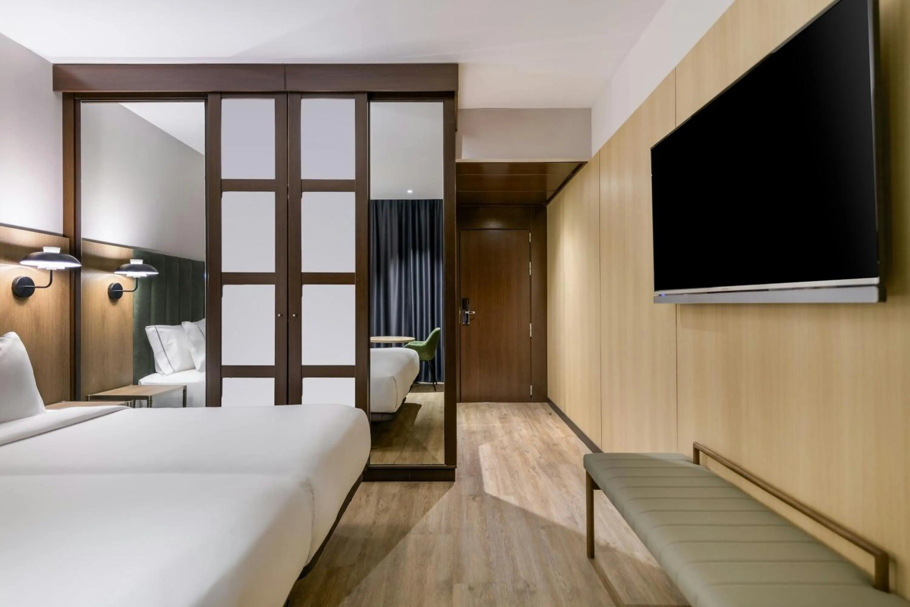 Photo of the whole room, Bed in AC Hotel Madrid Feria by Marriott