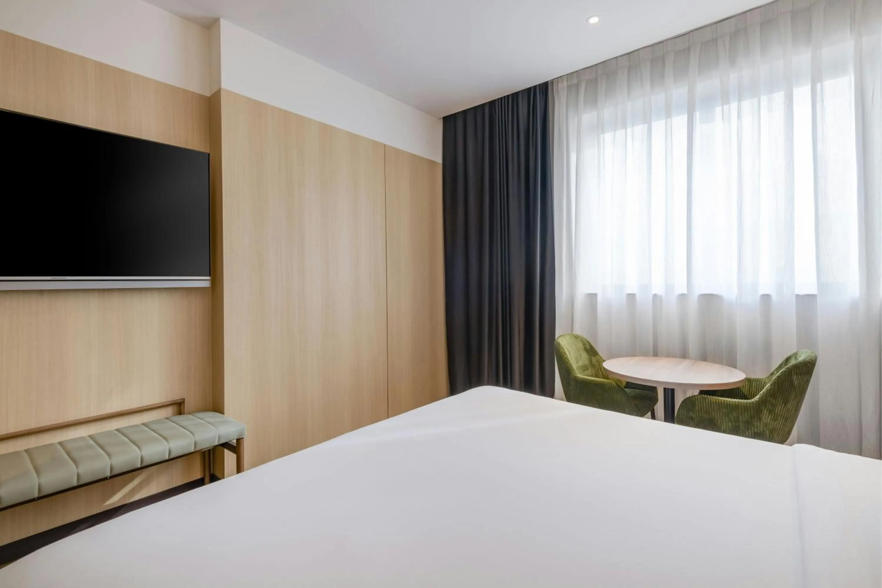 Photo of the whole room, Bed in AC Hotel Madrid Feria by Marriott