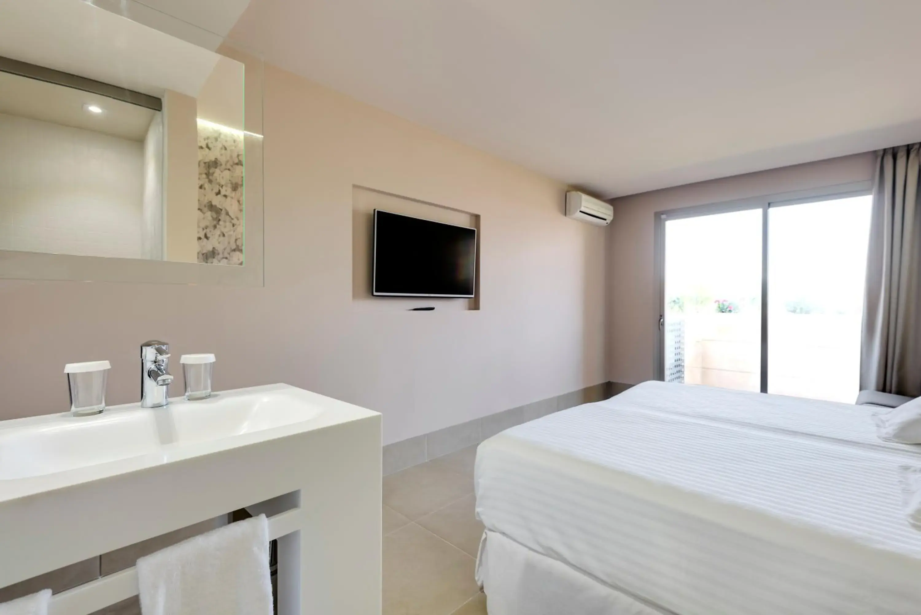 Bathroom, Bed in Occidental Ibiza - All Inclusive Bathroom, Bed in Occidental Ibiza - All Inclusive