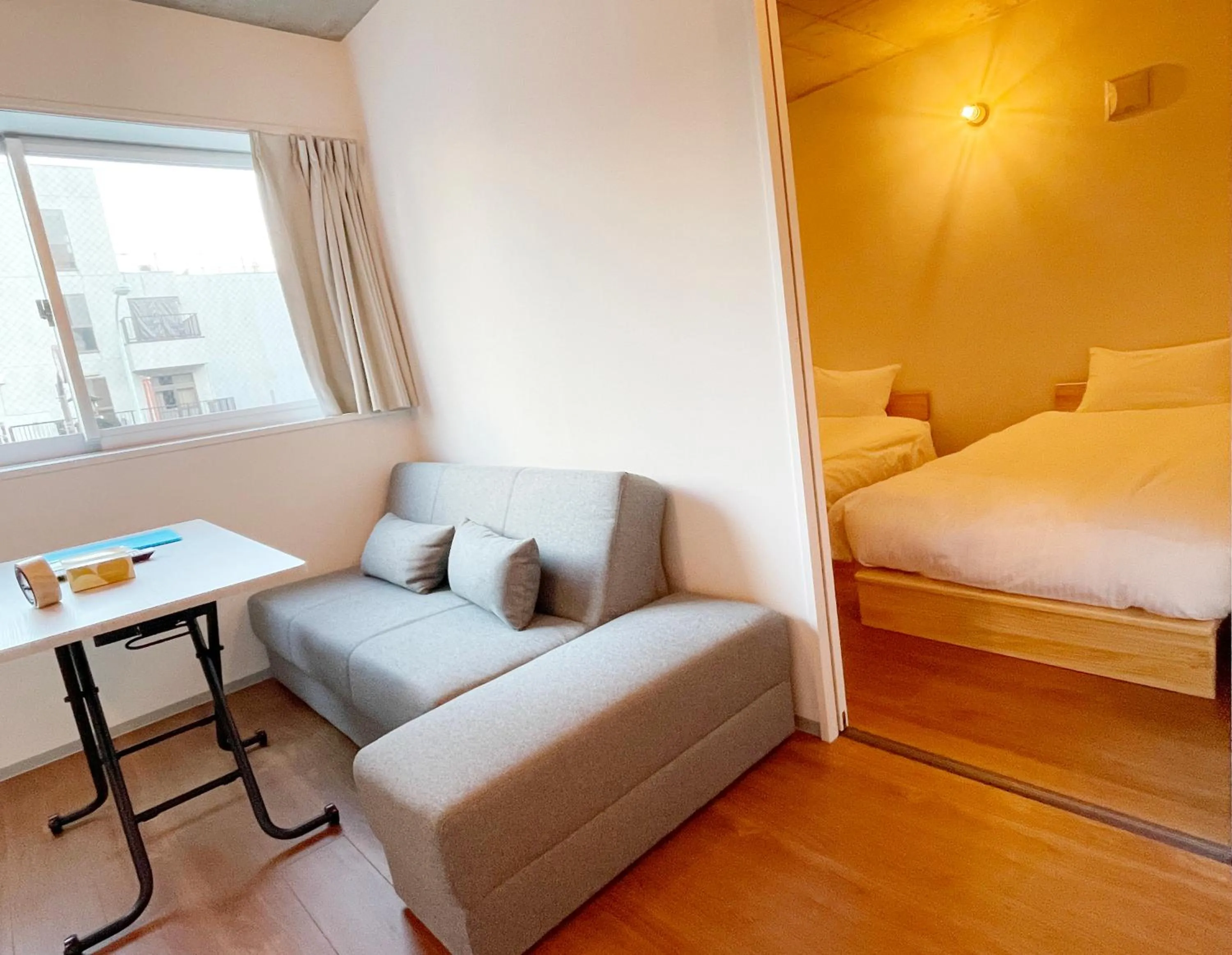 Living room, Bed in PRISM Inn Komagata Asakusa