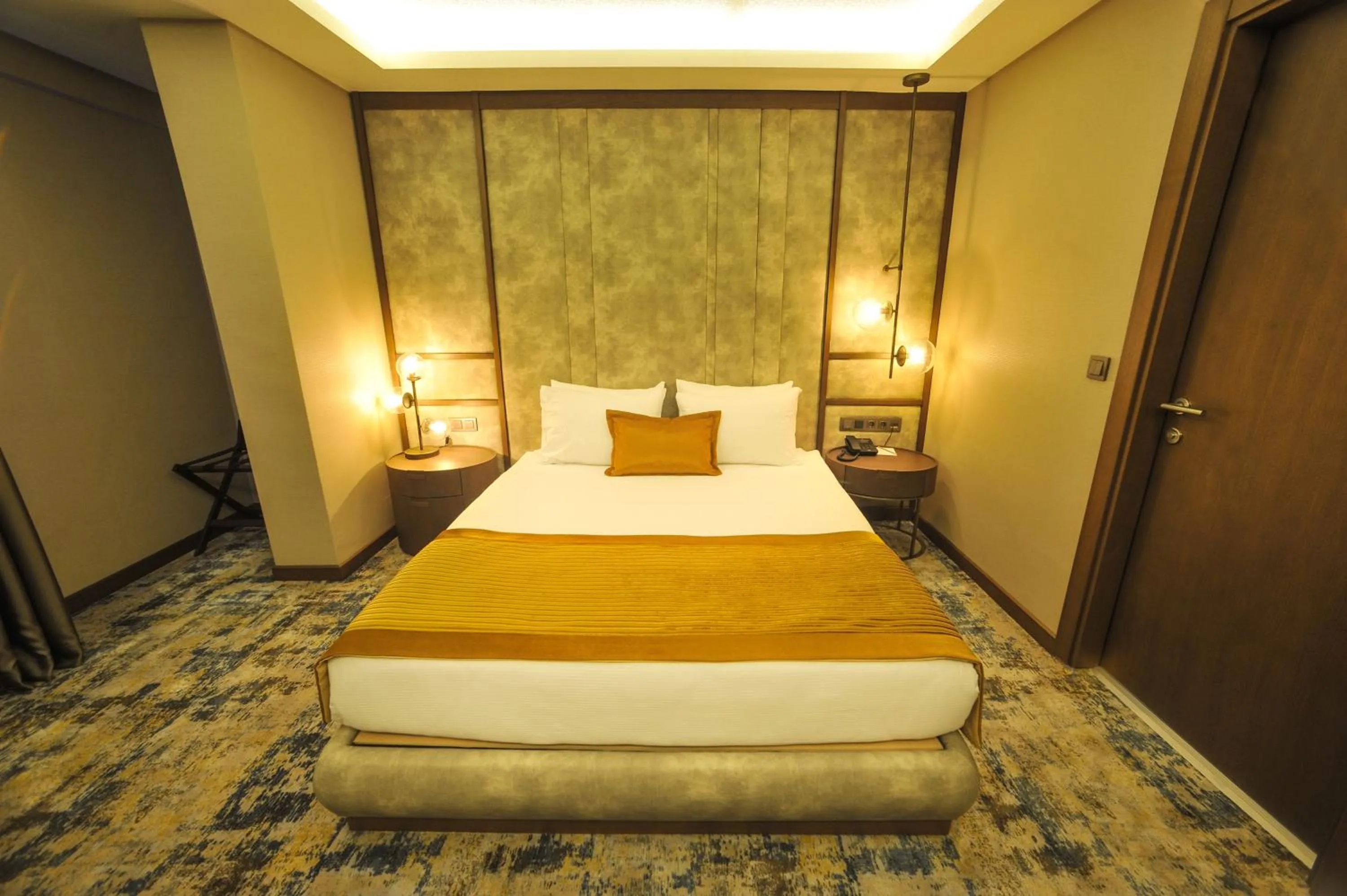 Bed in The Alpfine Hotel