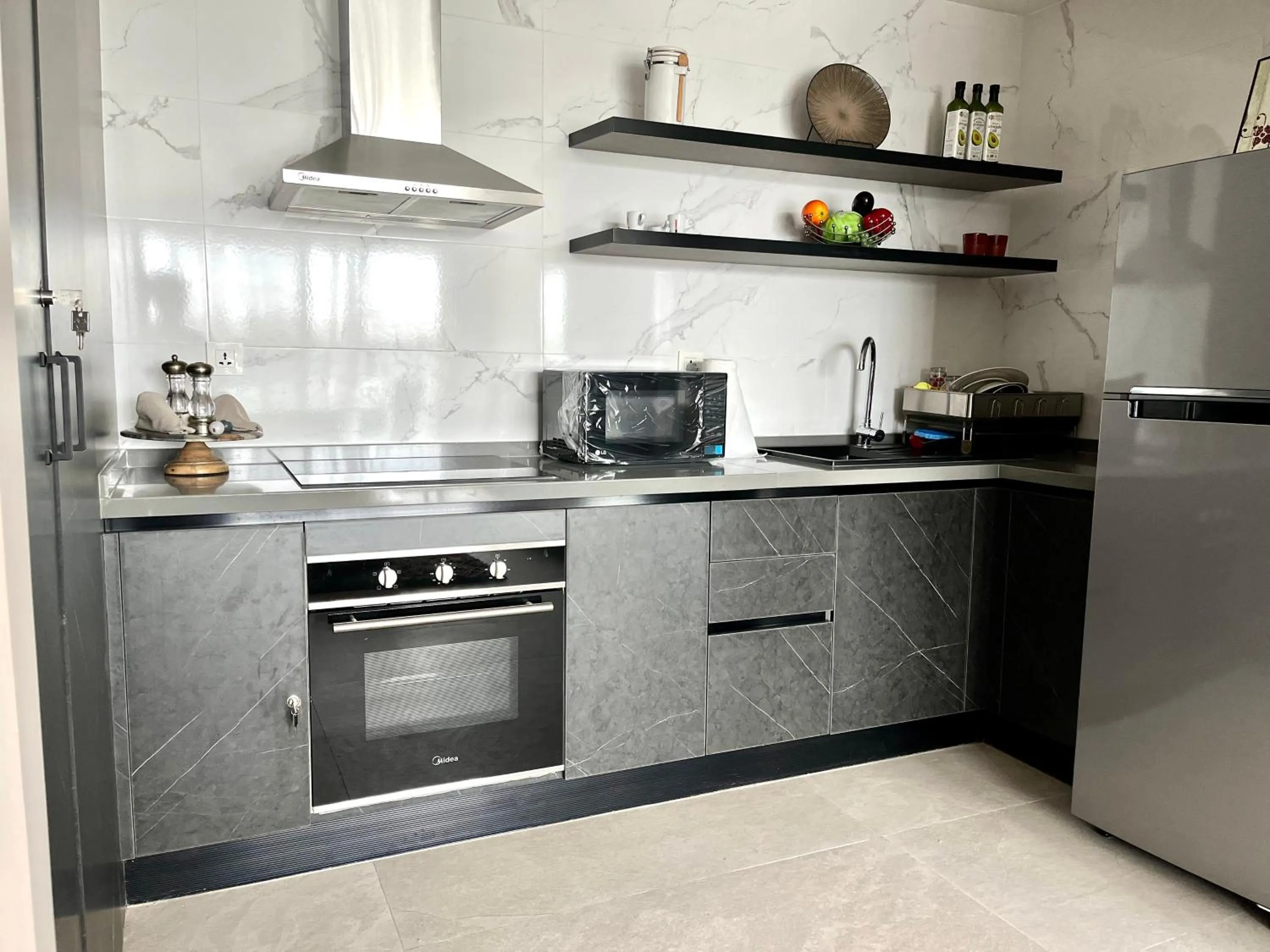 Kitchen or kitchenette in Kololi Sands Apartments