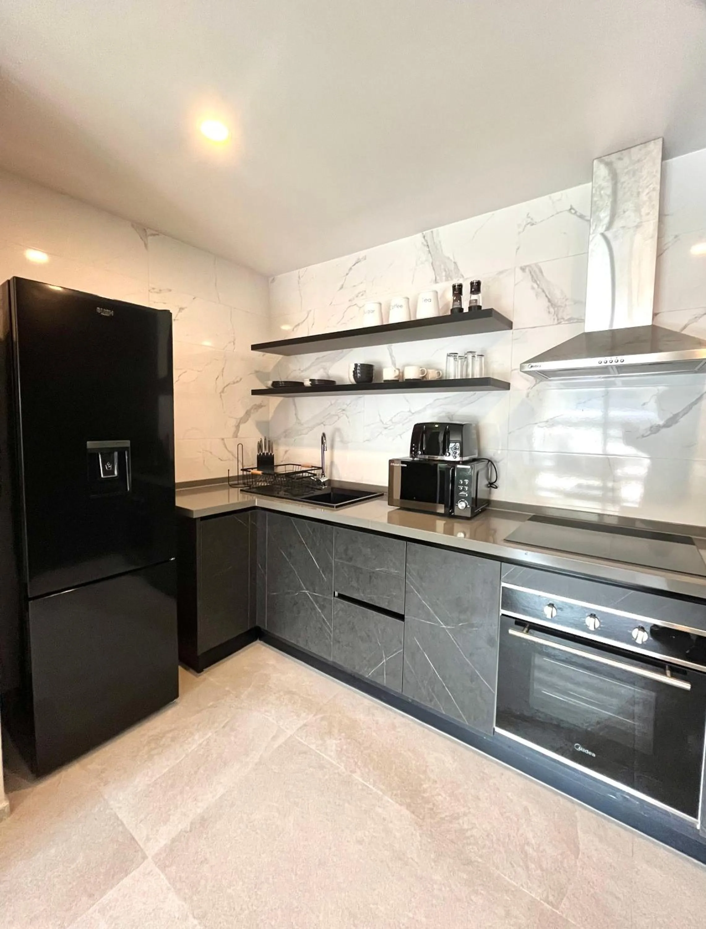 Kitchen or kitchenette in Kololi Sands Apartments